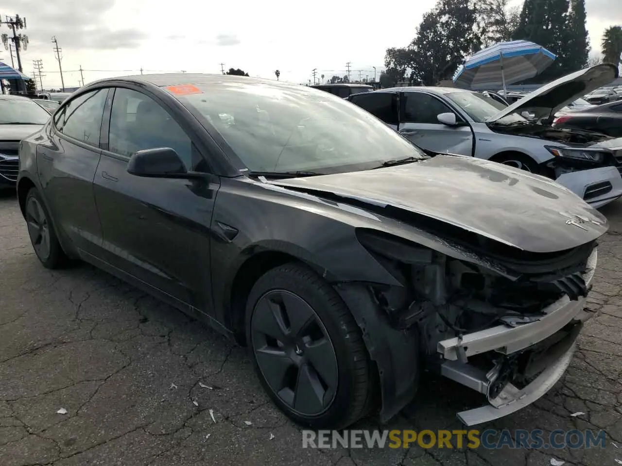 4 Photograph of a damaged car 5YJ3E1EA7PF460323 TESLA MODEL 3 2023