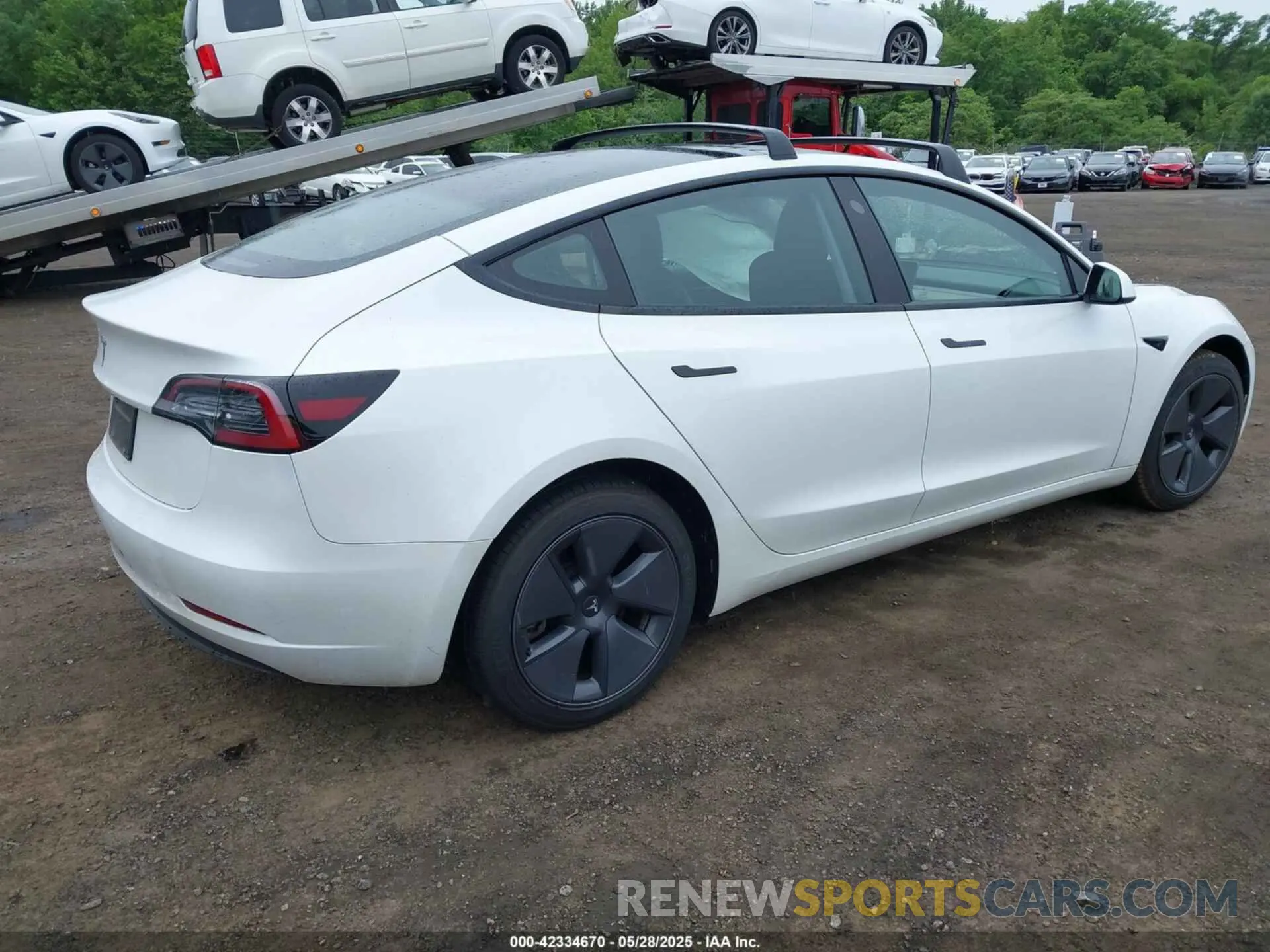 4 Photograph of a damaged car 5YJ3E1EA7PF470141 TESLA MODEL 3 2023