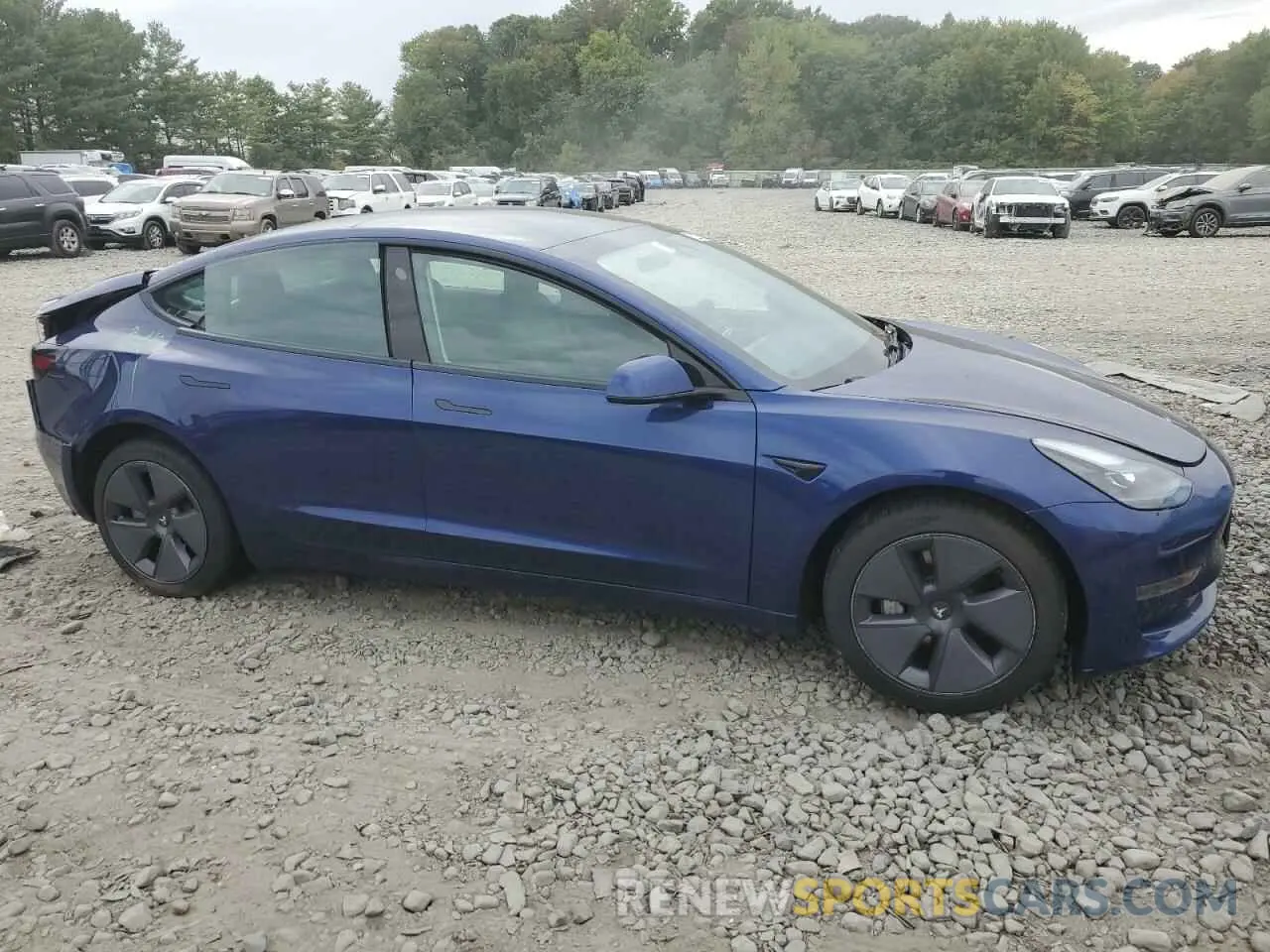 4 Photograph of a damaged car 5YJ3E1EA7PF471077 TESLA MODEL 3 2023