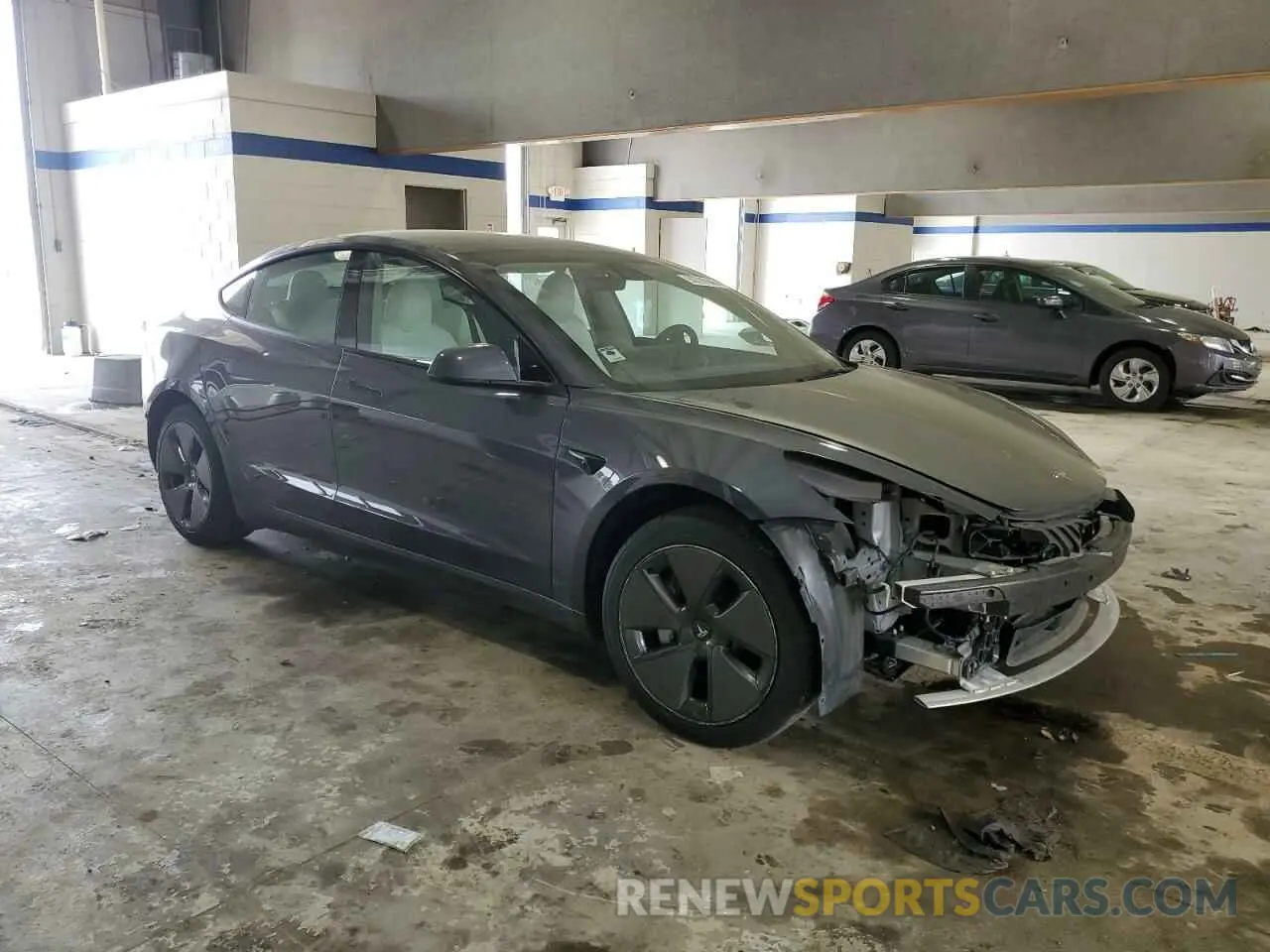 4 Photograph of a damaged car 5YJ3E1EA7PF549180 TESLA MODEL 3 2023