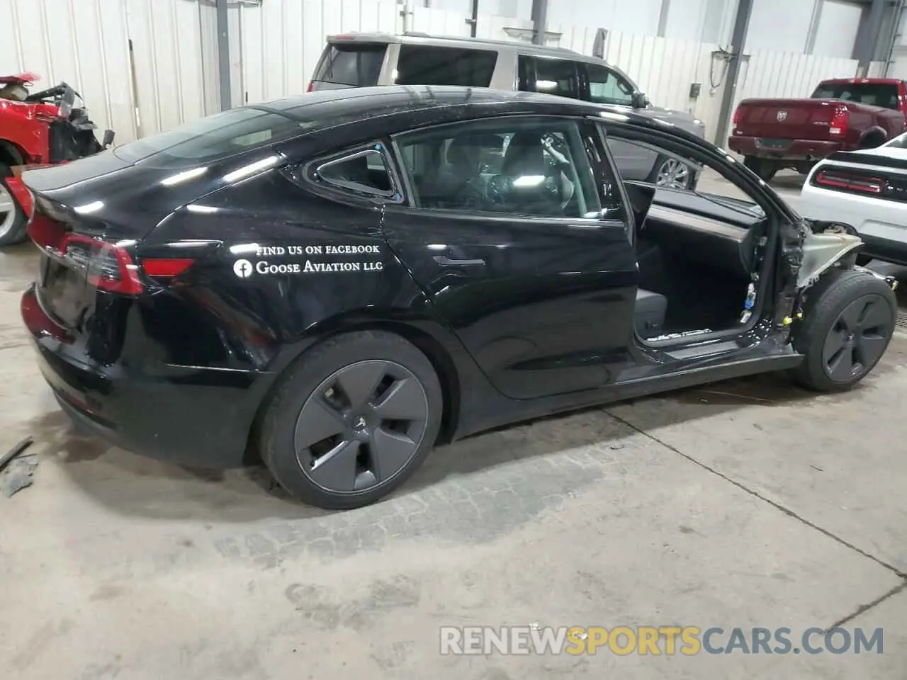 3 Photograph of a damaged car 5YJ3E1EA7PF604646 TESLA MODEL 3 2023
