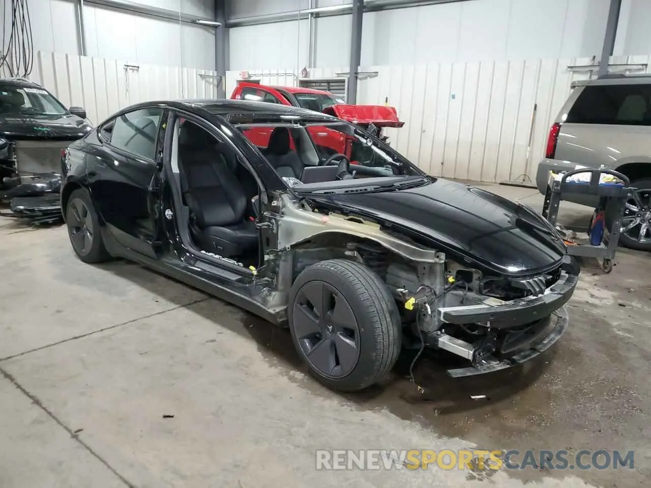4 Photograph of a damaged car 5YJ3E1EA7PF604646 TESLA MODEL 3 2023