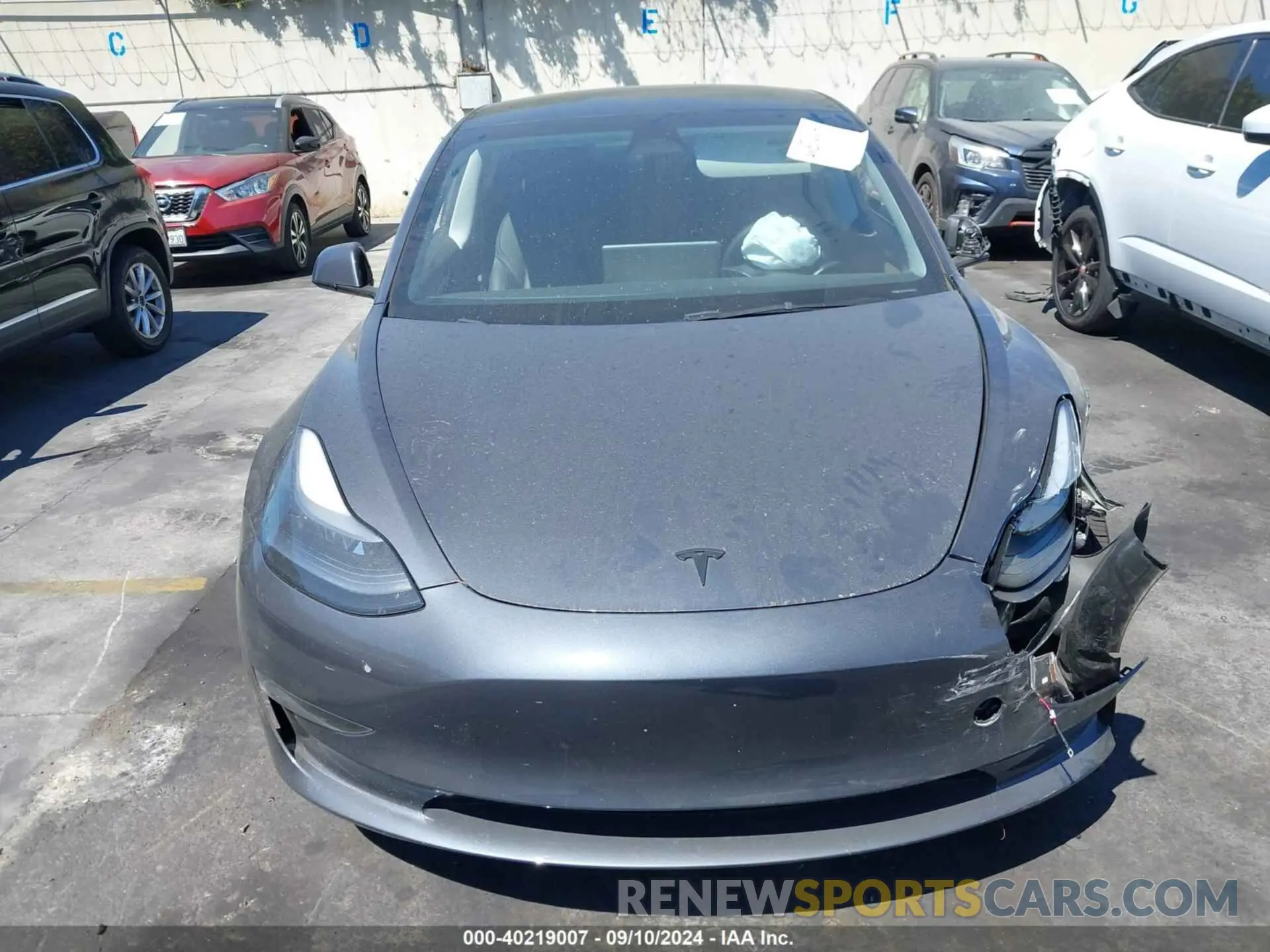 12 Photograph of a damaged car 5YJ3E1EA7PF611273 TESLA MODEL 3 2023