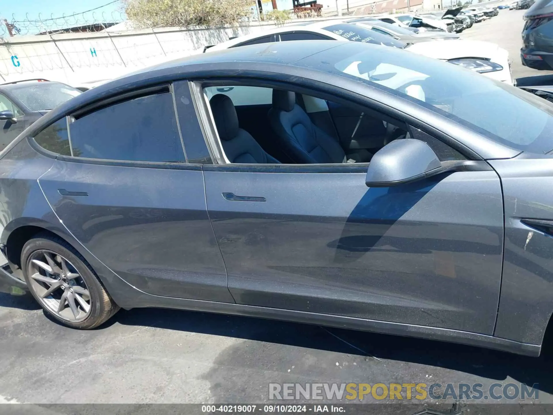 13 Photograph of a damaged car 5YJ3E1EA7PF611273 TESLA MODEL 3 2023