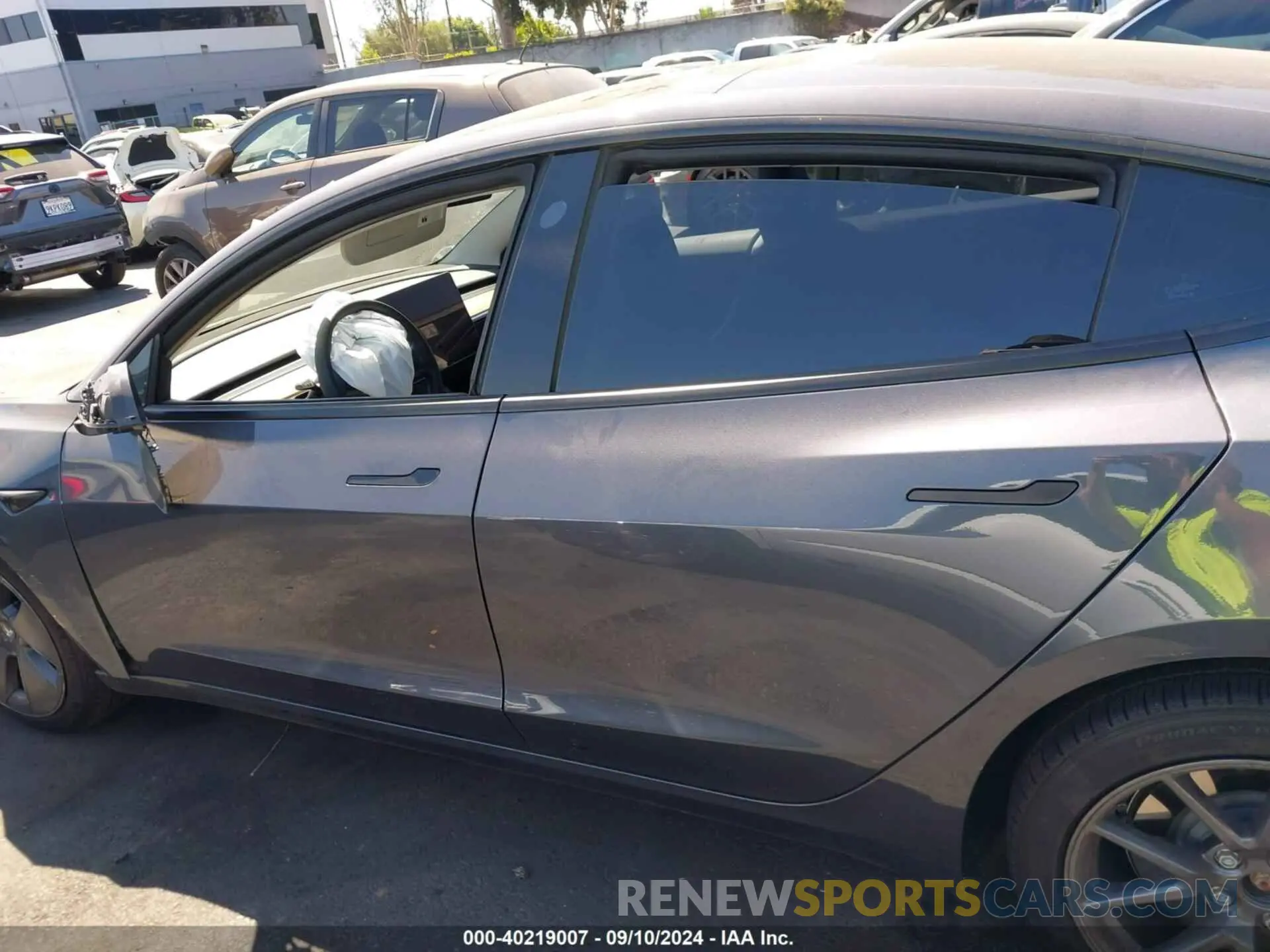 14 Photograph of a damaged car 5YJ3E1EA7PF611273 TESLA MODEL 3 2023