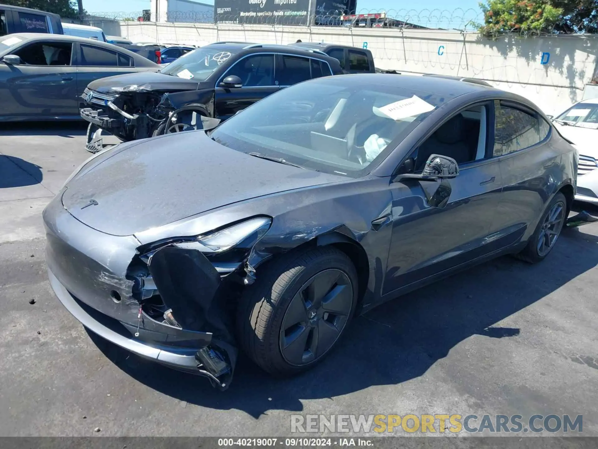 2 Photograph of a damaged car 5YJ3E1EA7PF611273 TESLA MODEL 3 2023