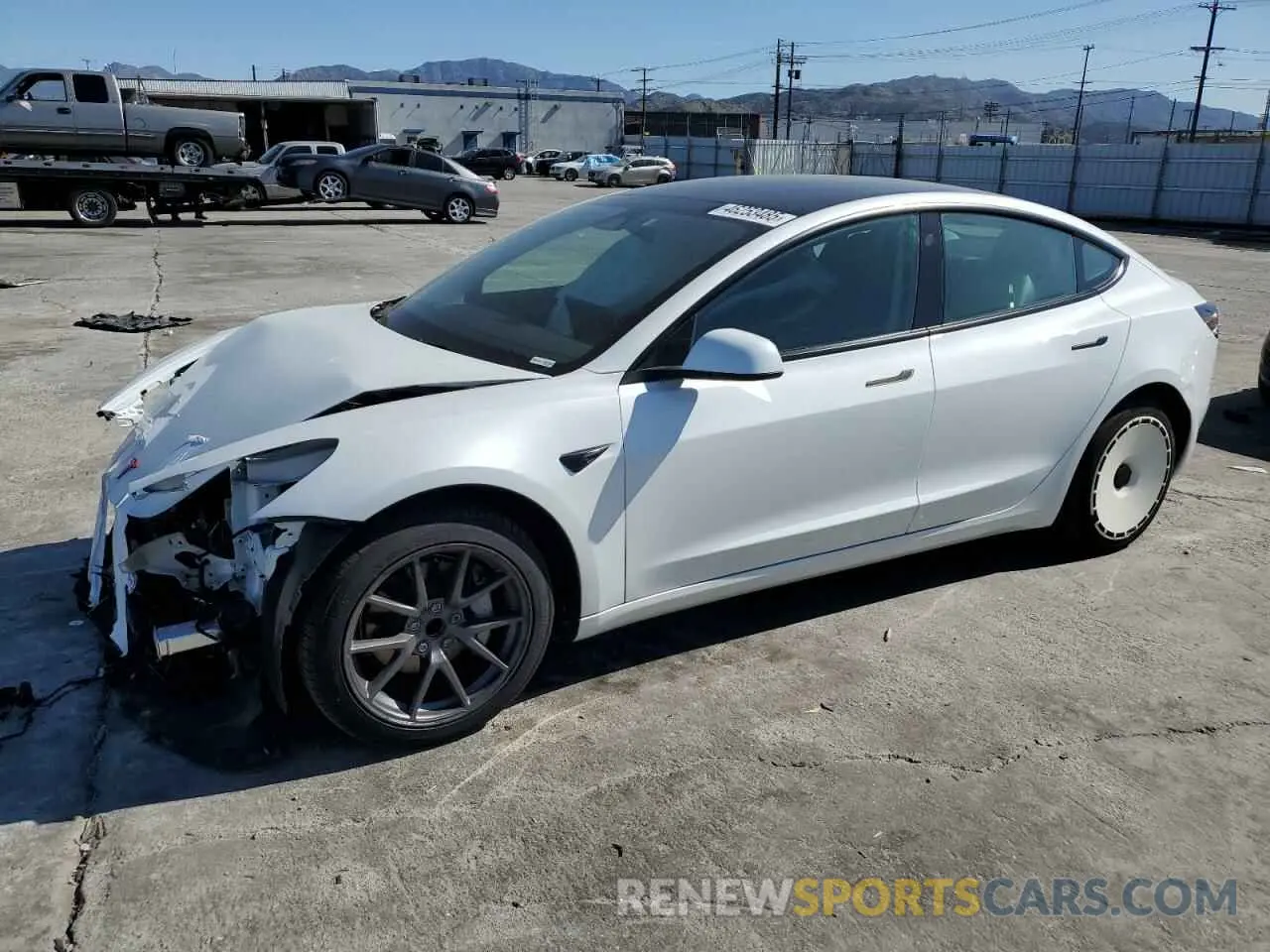 1 Photograph of a damaged car 5YJ3E1EA7PF612018 TESLA MODEL 3 2023