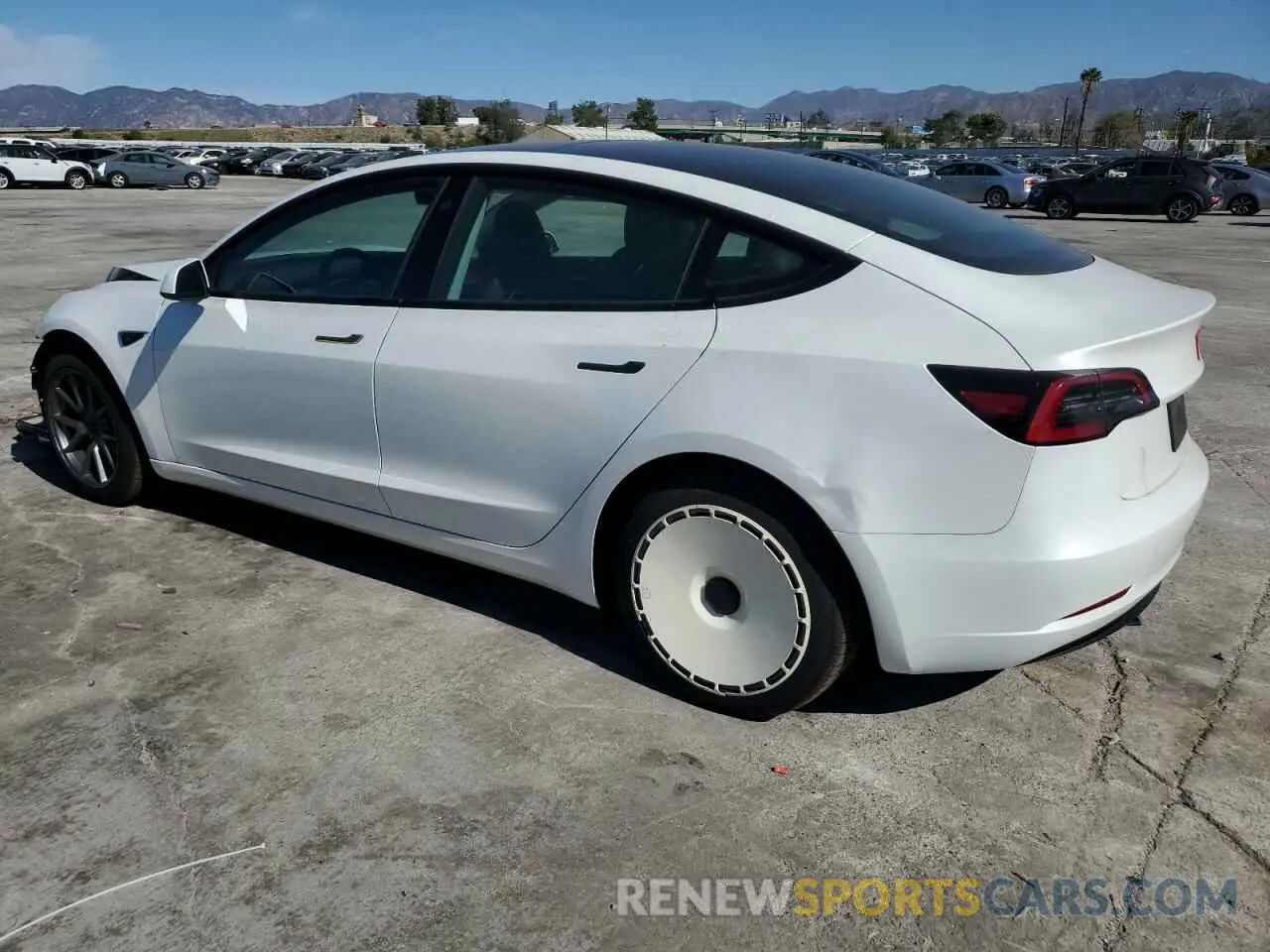 2 Photograph of a damaged car 5YJ3E1EA7PF612018 TESLA MODEL 3 2023
