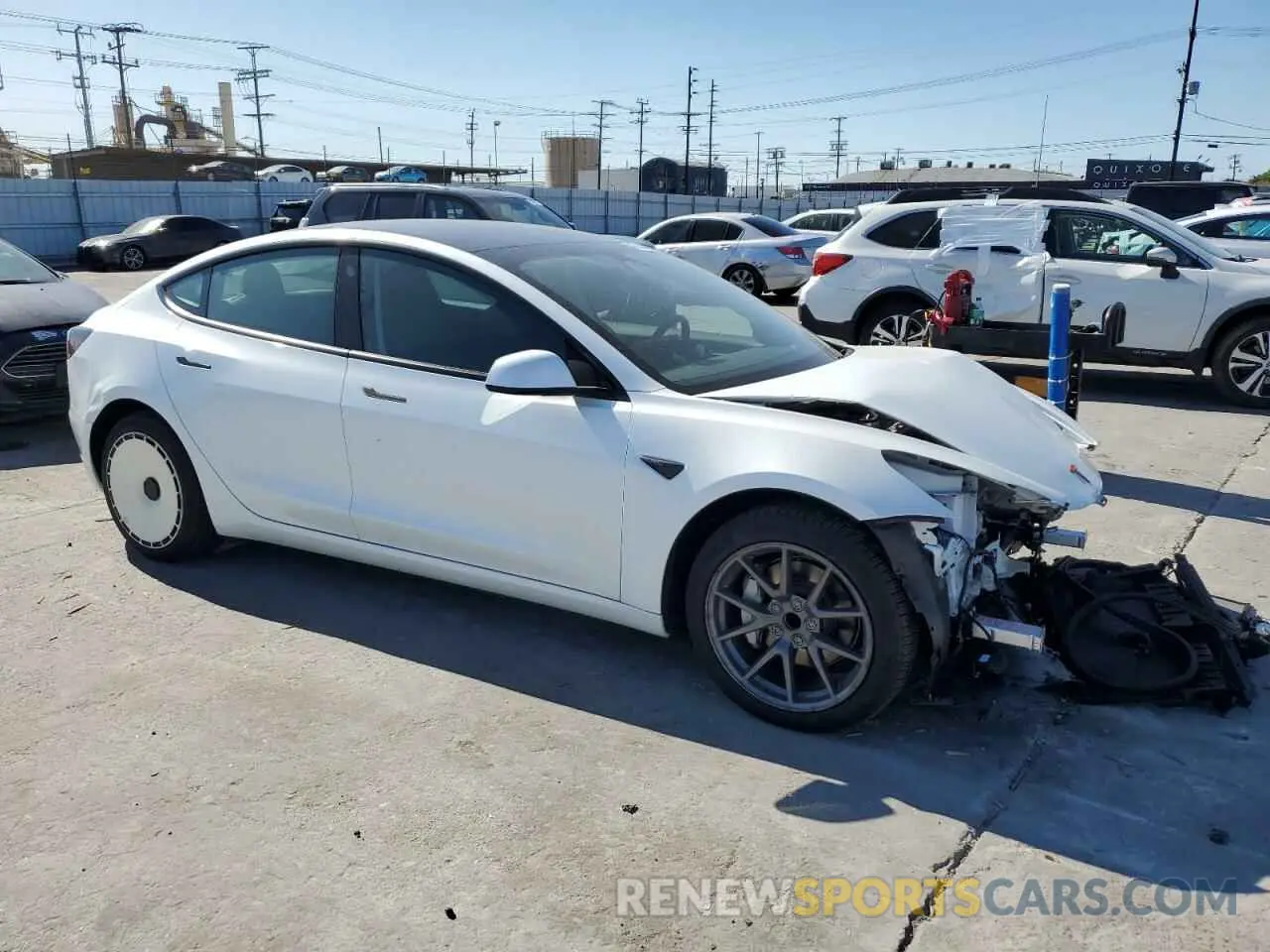 4 Photograph of a damaged car 5YJ3E1EA7PF612018 TESLA MODEL 3 2023