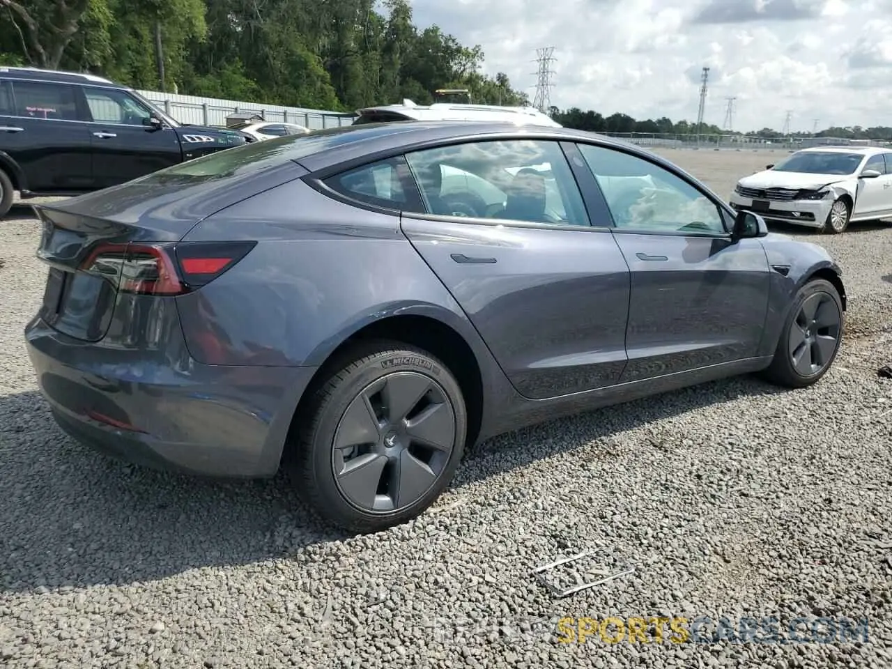 3 Photograph of a damaged car 5YJ3E1EA7PF649103 TESLA MODEL 3 2023