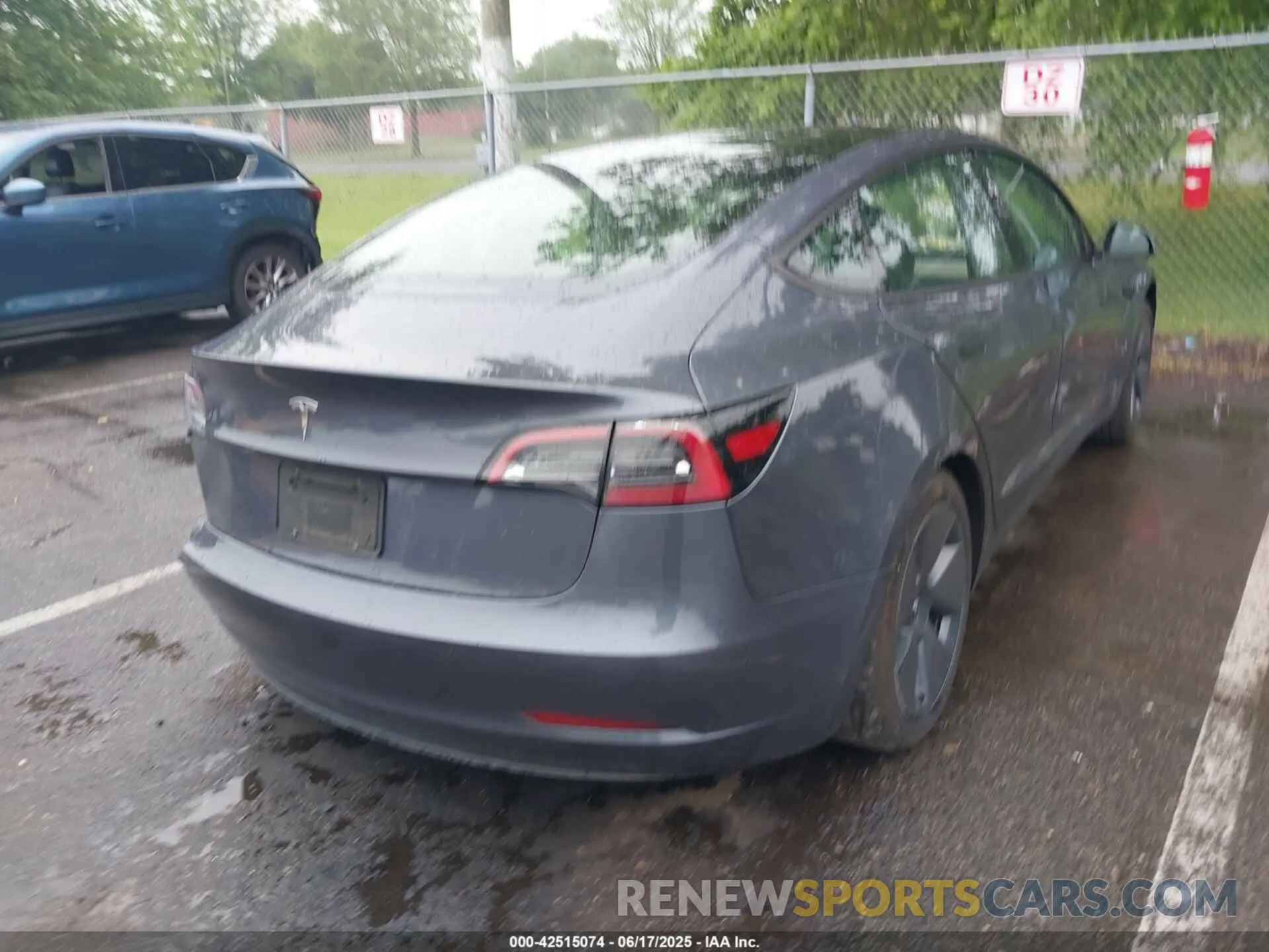 4 Photograph of a damaged car 5YJ3E1EA7PF658464 TESLA MODEL 3 2023