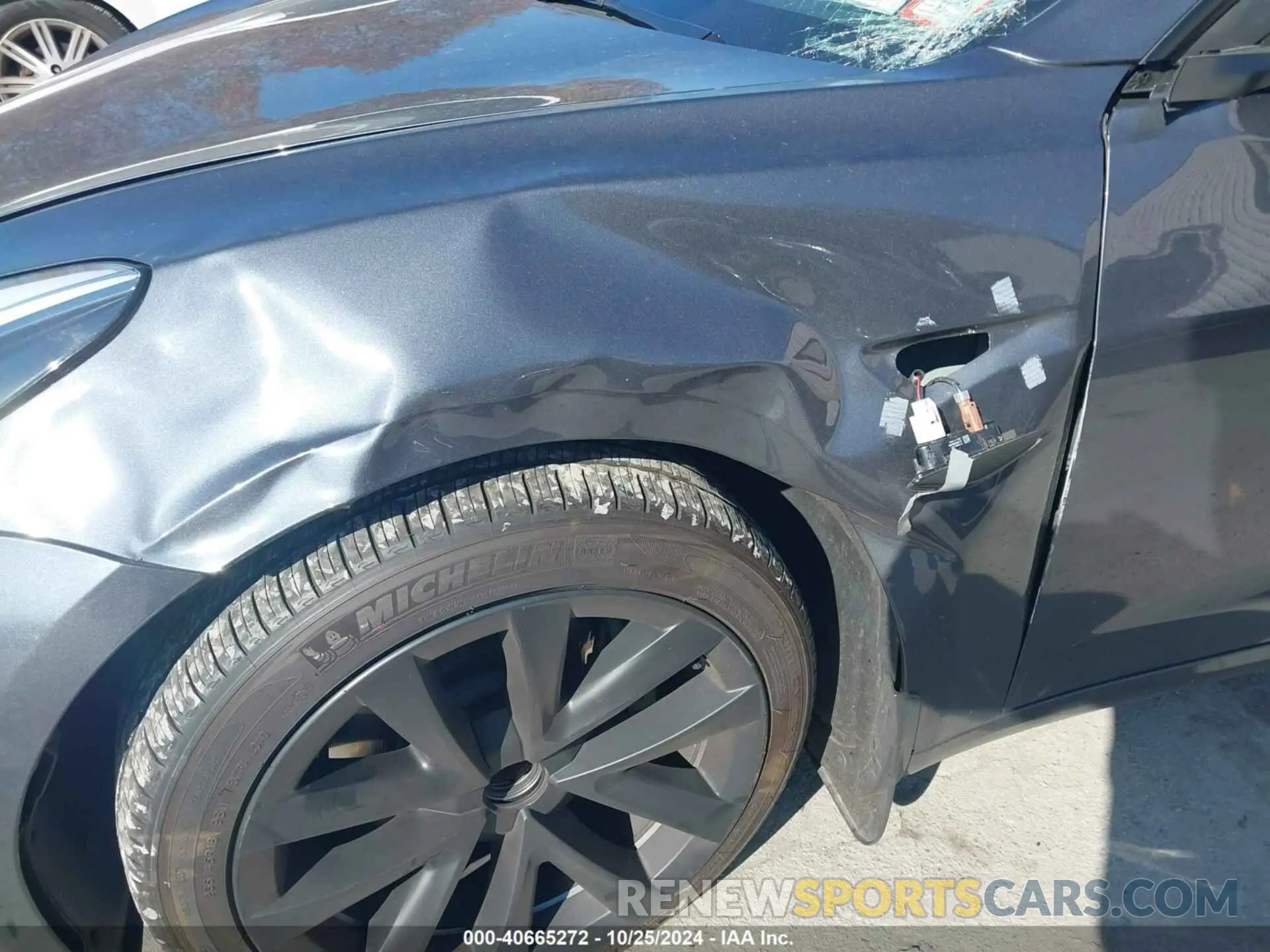 19 Photograph of a damaged car 5YJ3E1EA7PF680674 TESLA MODEL 3 2023