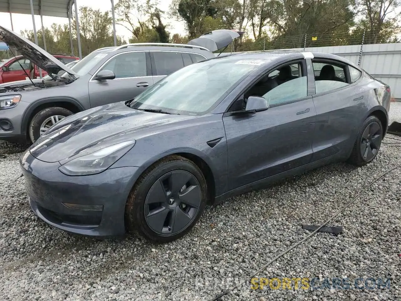1 Photograph of a damaged car 5YJ3E1EA7PF682246 TESLA MODEL 3 2023