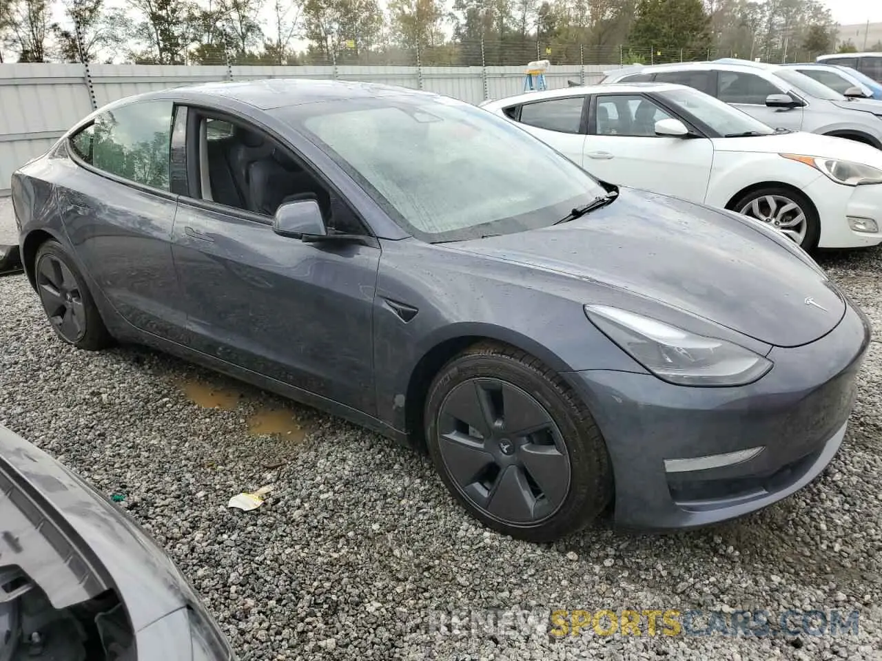 4 Photograph of a damaged car 5YJ3E1EA7PF682246 TESLA MODEL 3 2023