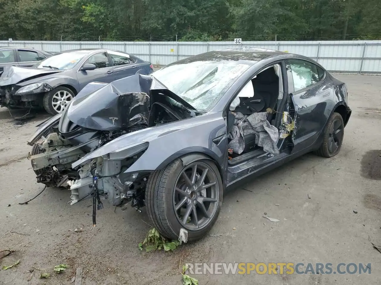 1 Photograph of a damaged car 5YJ3E1EA7PF692047 TESLA MODEL 3 2023