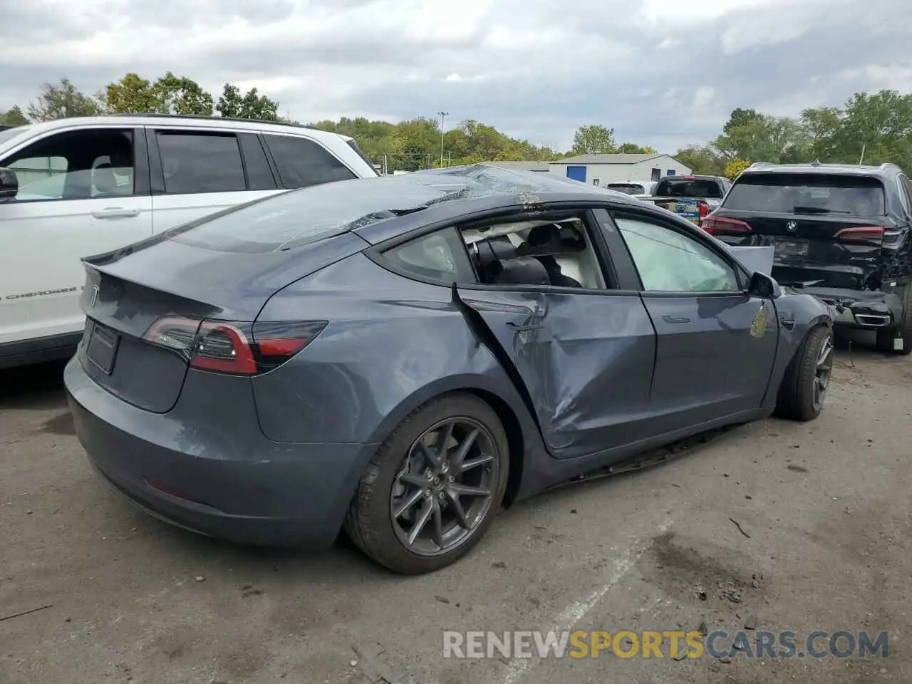 3 Photograph of a damaged car 5YJ3E1EA7PF692047 TESLA MODEL 3 2023
