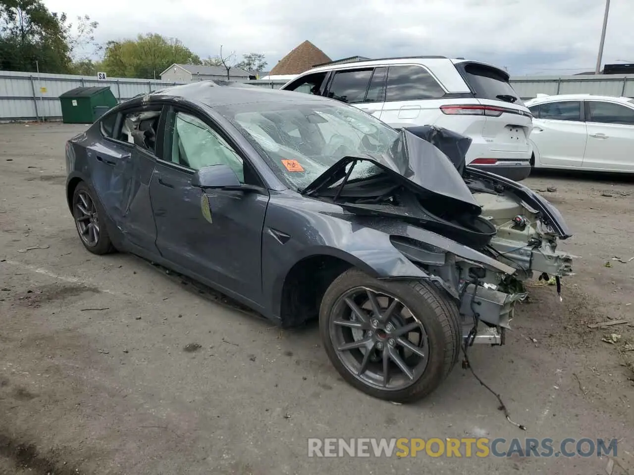 4 Photograph of a damaged car 5YJ3E1EA7PF692047 TESLA MODEL 3 2023