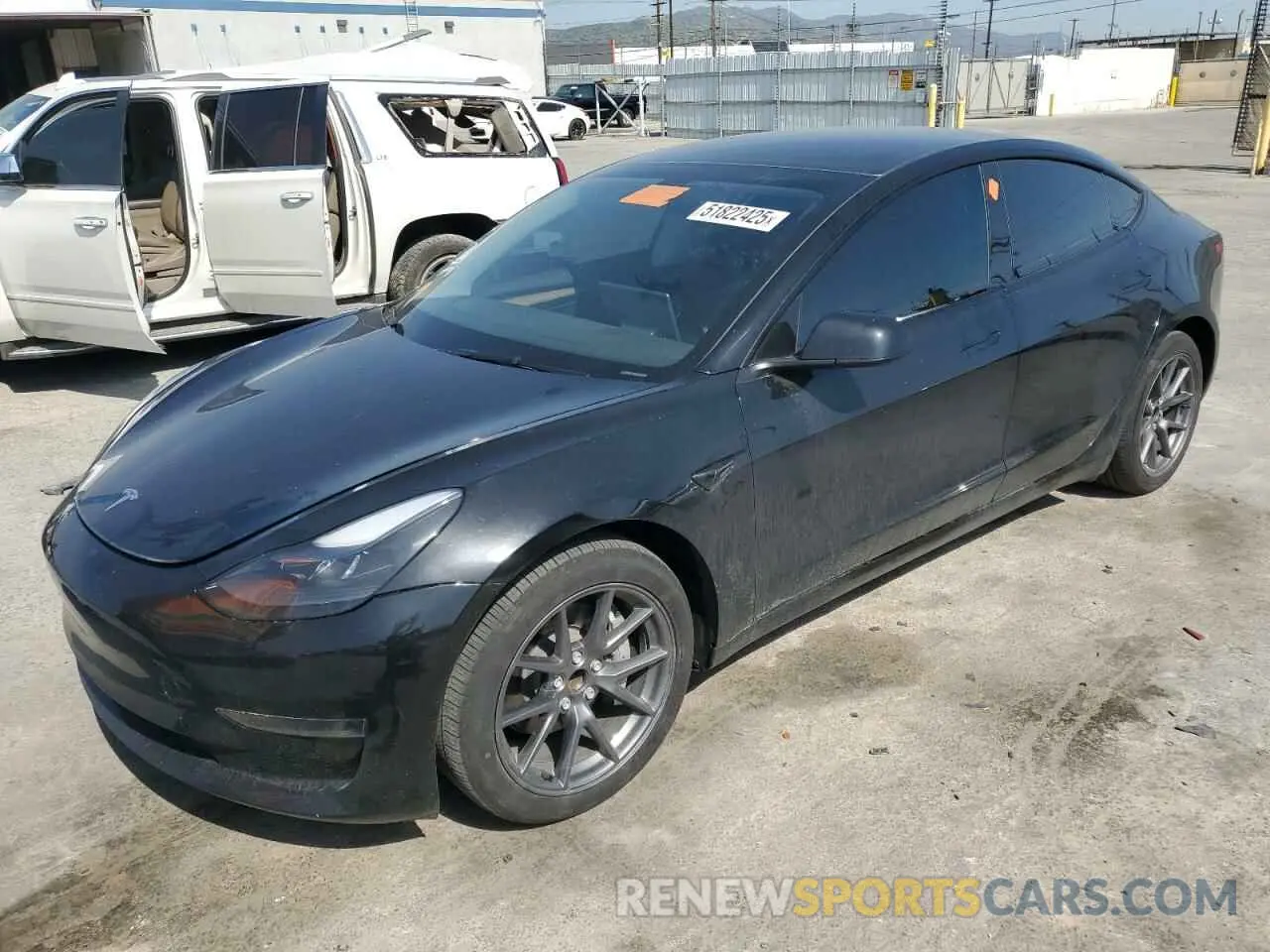 1 Photograph of a damaged car 5YJ3E1EA7PF694008 TESLA MODEL 3 2023