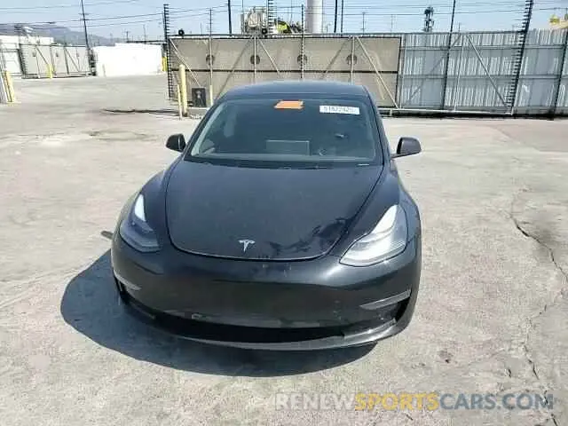 11 Photograph of a damaged car 5YJ3E1EA7PF694008 TESLA MODEL 3 2023