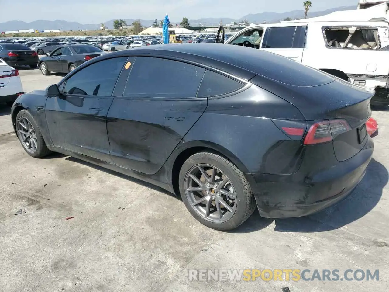 2 Photograph of a damaged car 5YJ3E1EA7PF694008 TESLA MODEL 3 2023