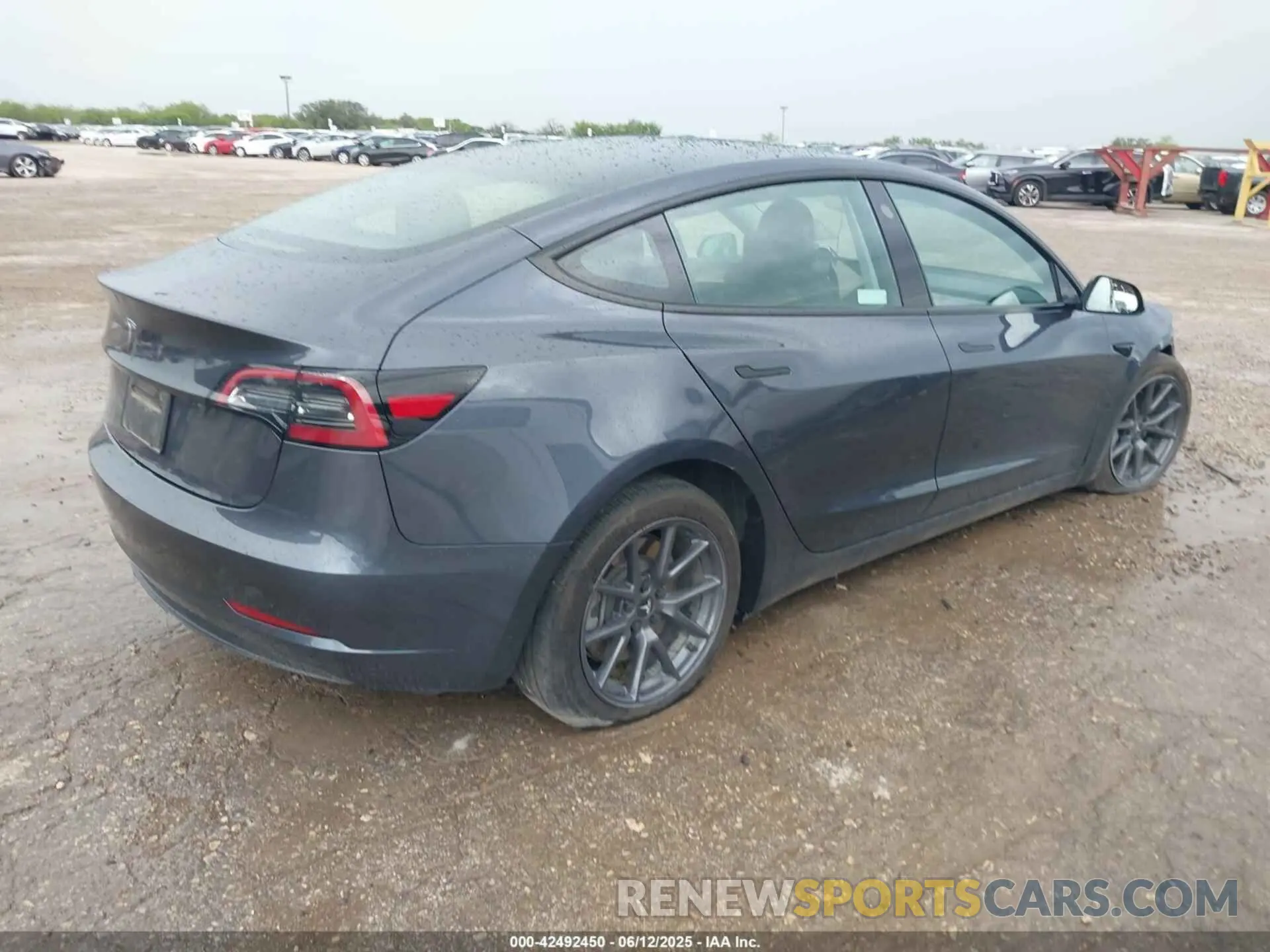 4 Photograph of a damaged car 5YJ3E1EA7PF701264 TESLA MODEL 3 2023