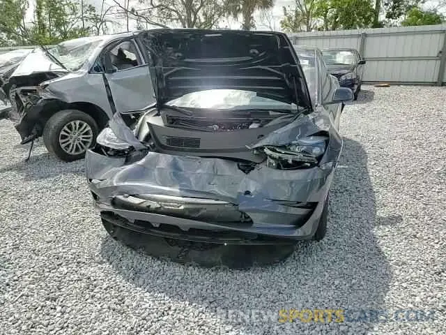 11 Photograph of a damaged car 5YJ3E1EA7PF705024 TESLA MODEL 3 2023
