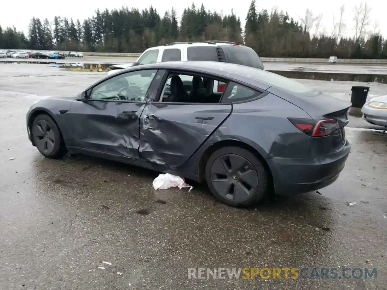 2 Photograph of a damaged car 5YJ3E1EA7PF711664 TESLA MODEL 3 2023