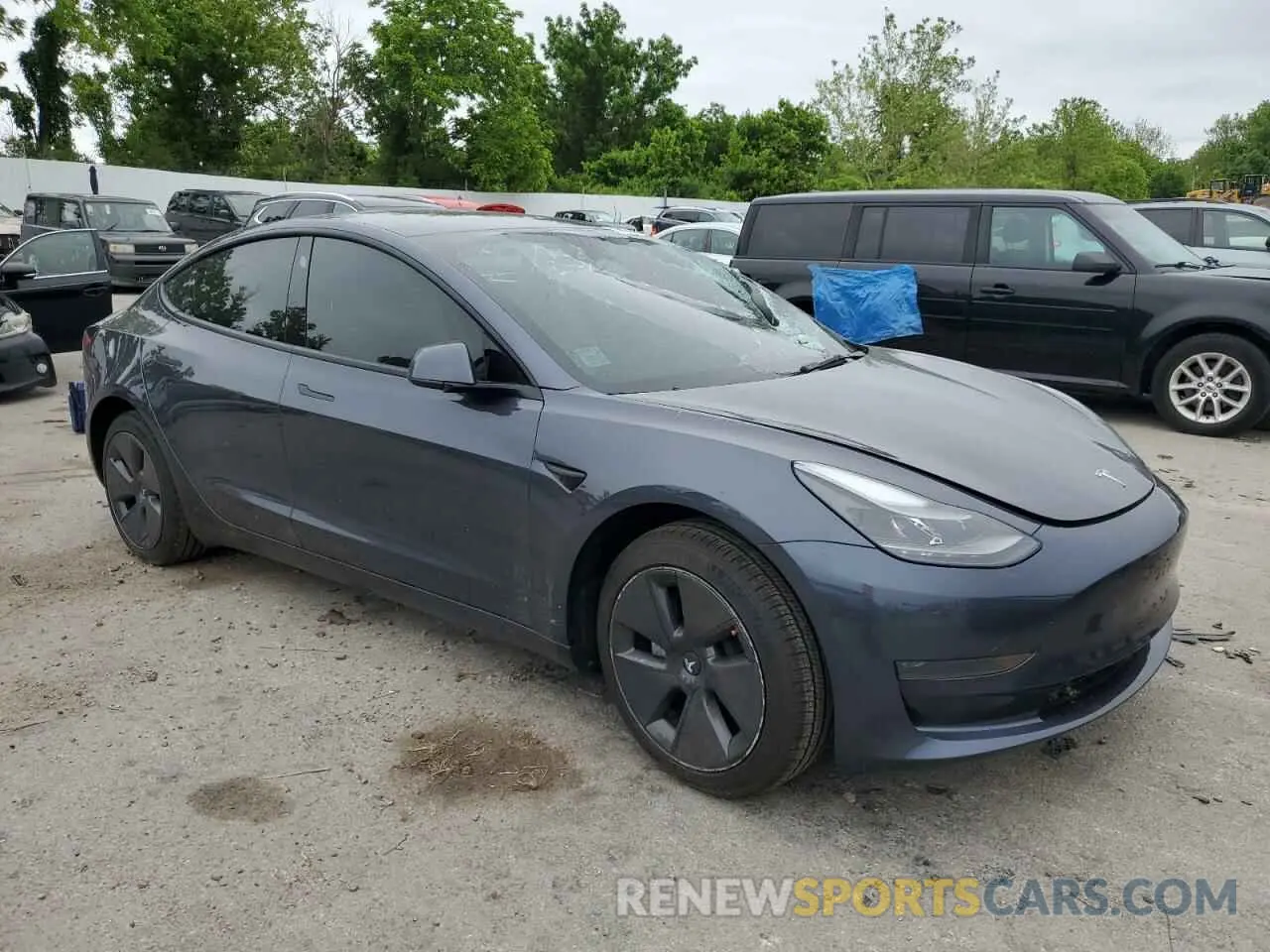 4 Photograph of a damaged car 5YJ3E1EA8PF382697 TESLA MODEL 3 2023