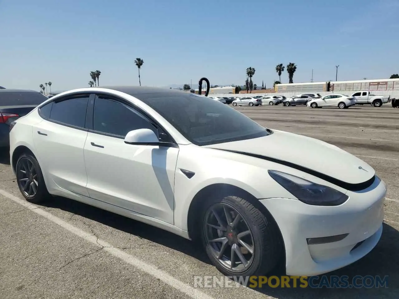 4 Photograph of a damaged car 5YJ3E1EA8PF394705 TESLA MODEL 3 2023