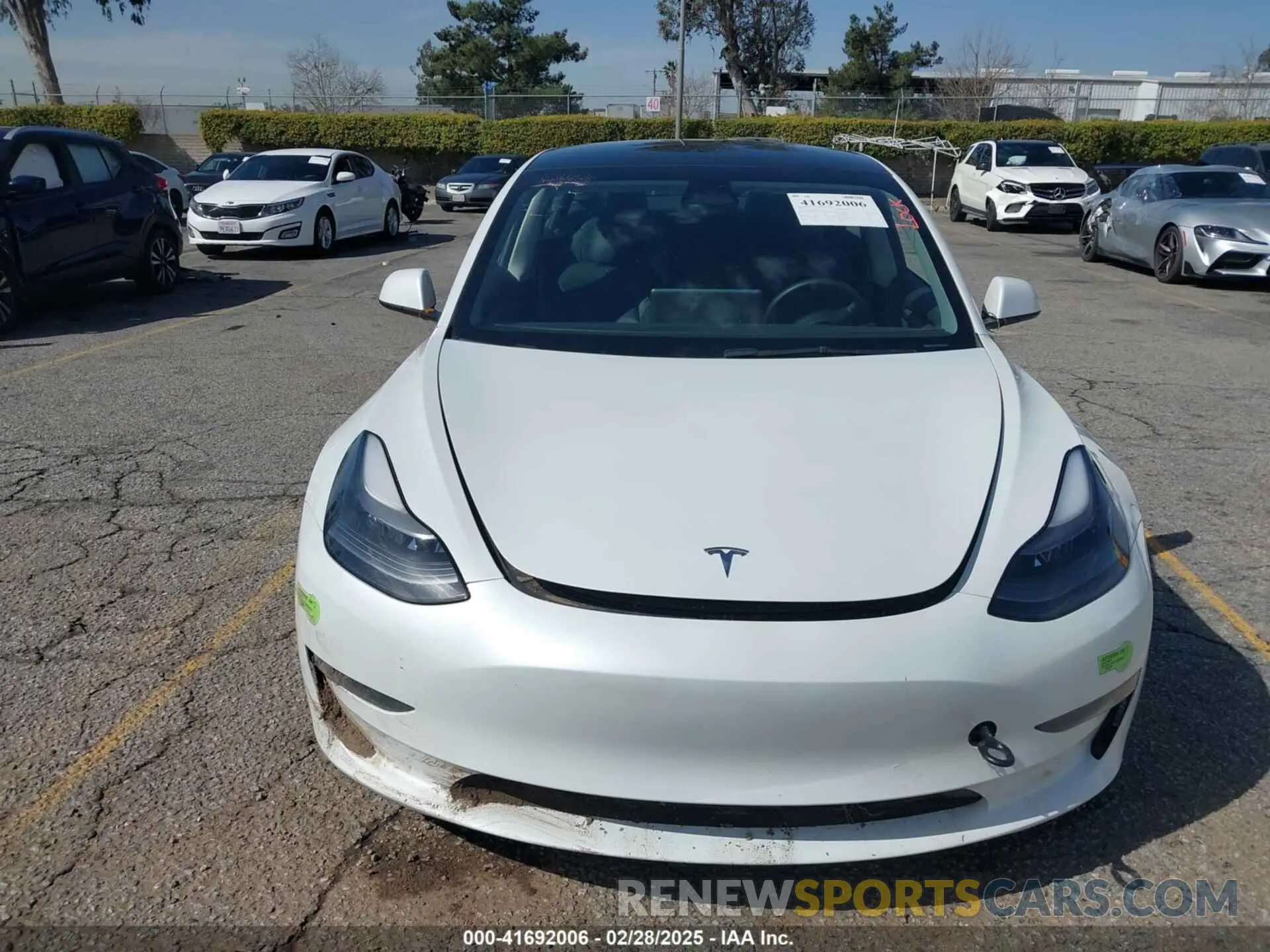 12 Photograph of a damaged car 5YJ3E1EA8PF398110 TESLA MODEL 3 2023