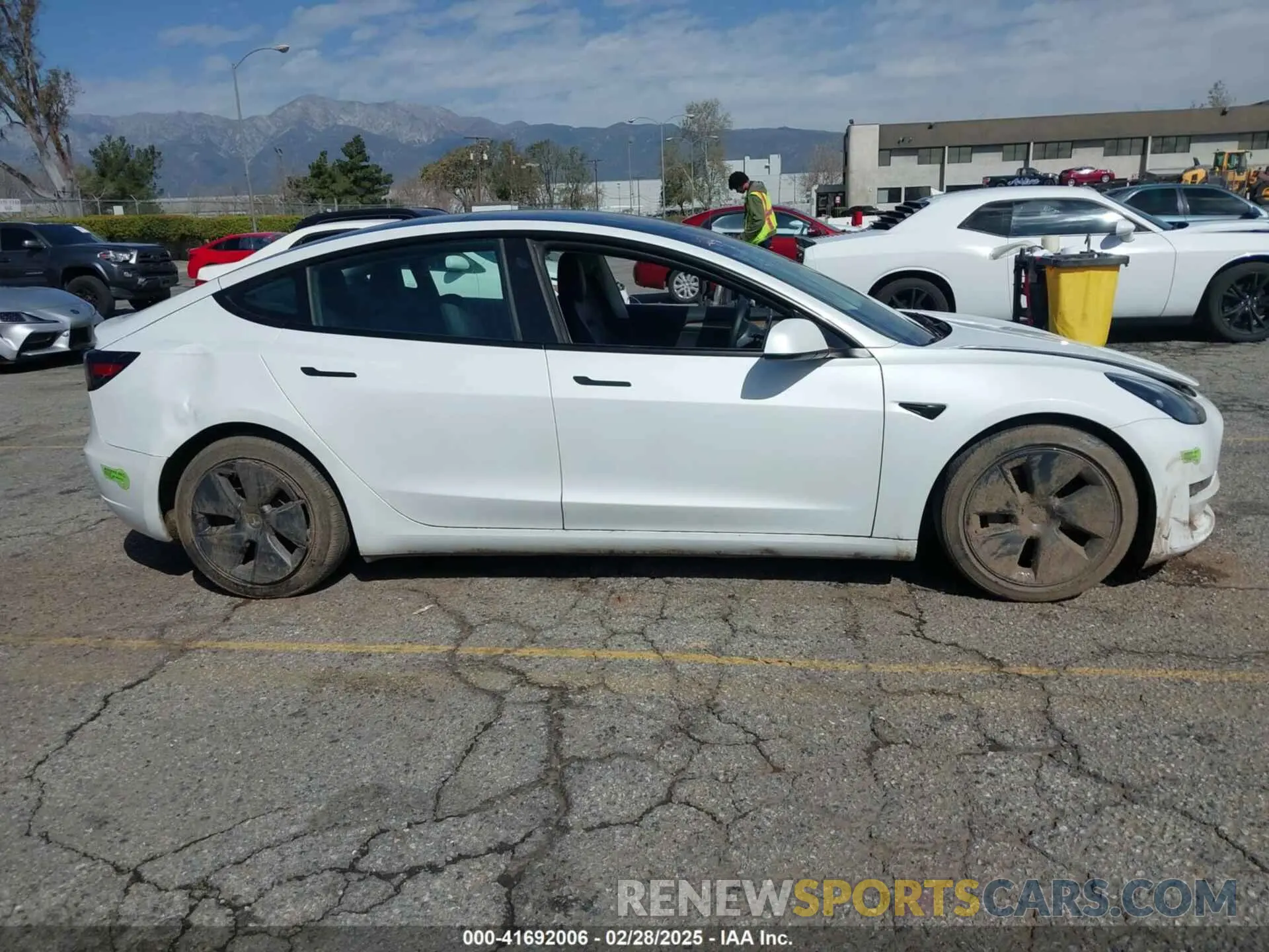 13 Photograph of a damaged car 5YJ3E1EA8PF398110 TESLA MODEL 3 2023