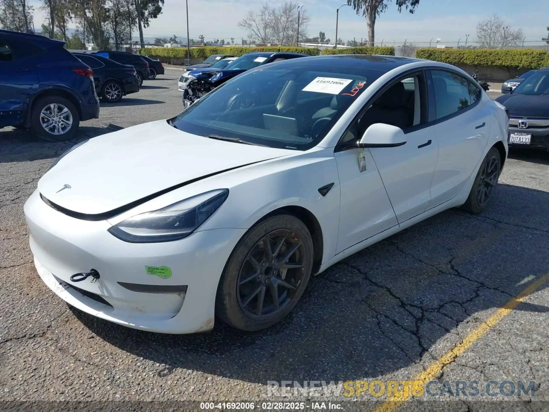 2 Photograph of a damaged car 5YJ3E1EA8PF398110 TESLA MODEL 3 2023