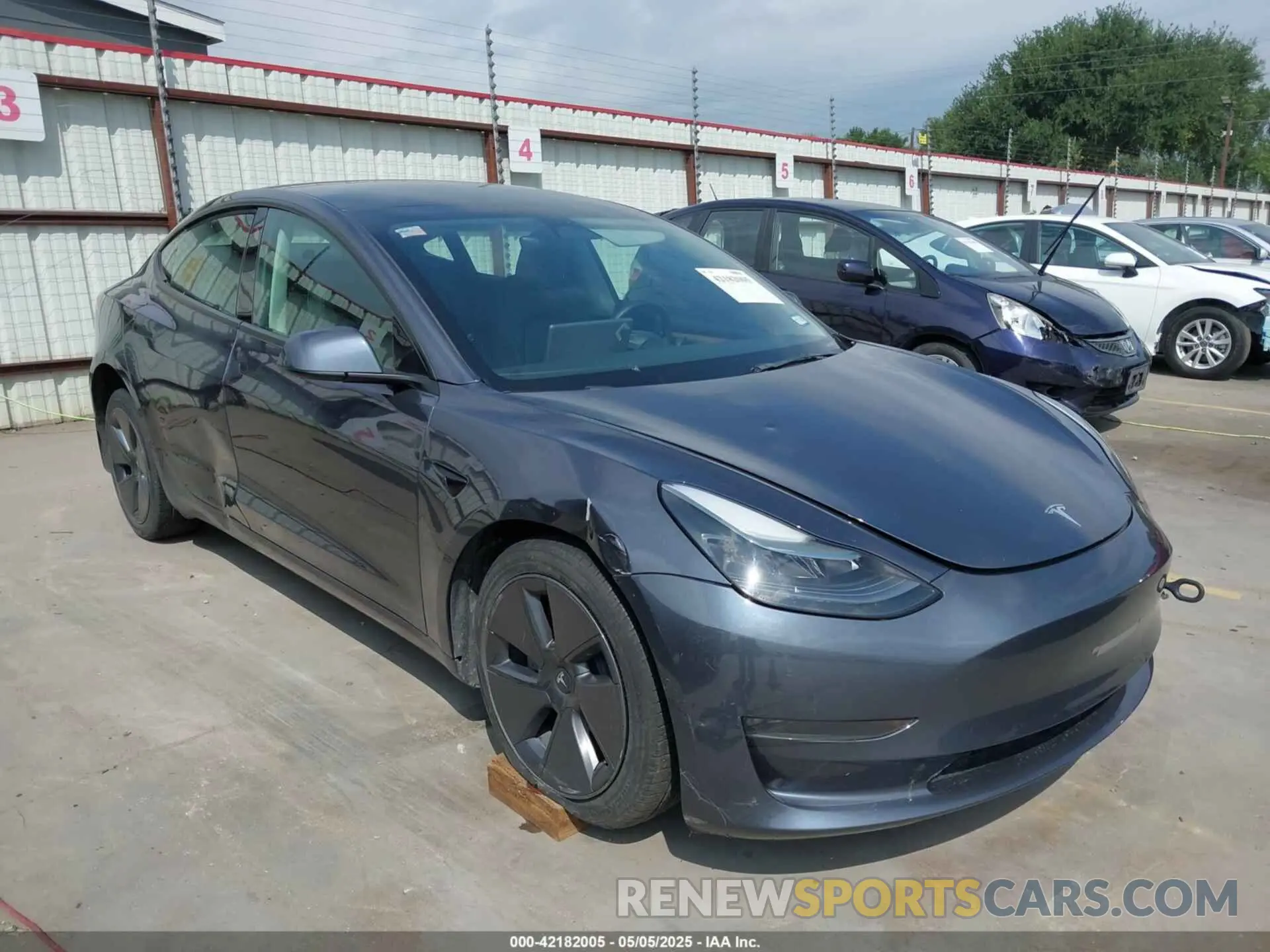 1 Photograph of a damaged car 5YJ3E1EA8PF404553 TESLA MODEL 3 2023
