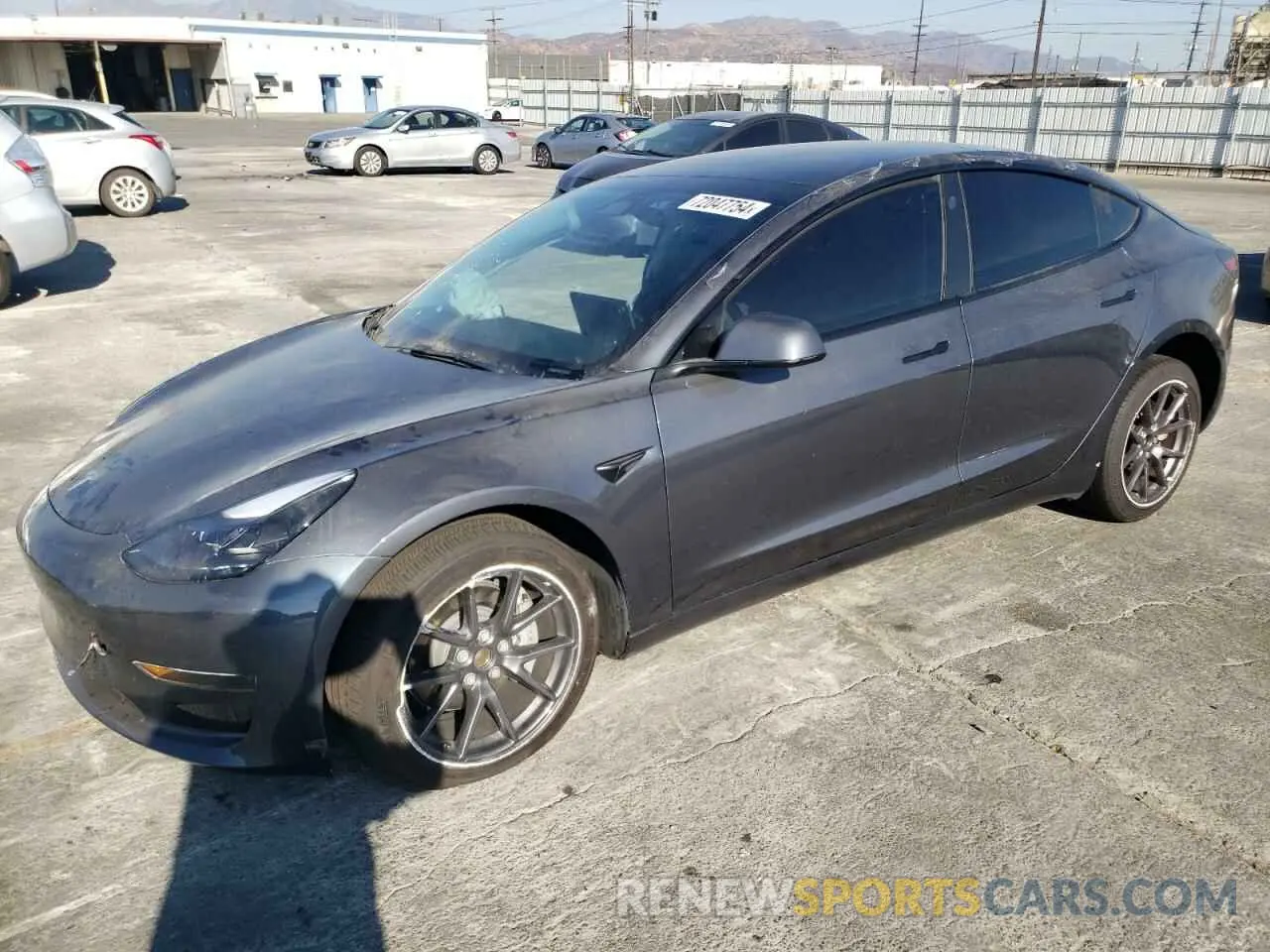 1 Photograph of a damaged car 5YJ3E1EA8PF411034 TESLA MODEL 3 2023
