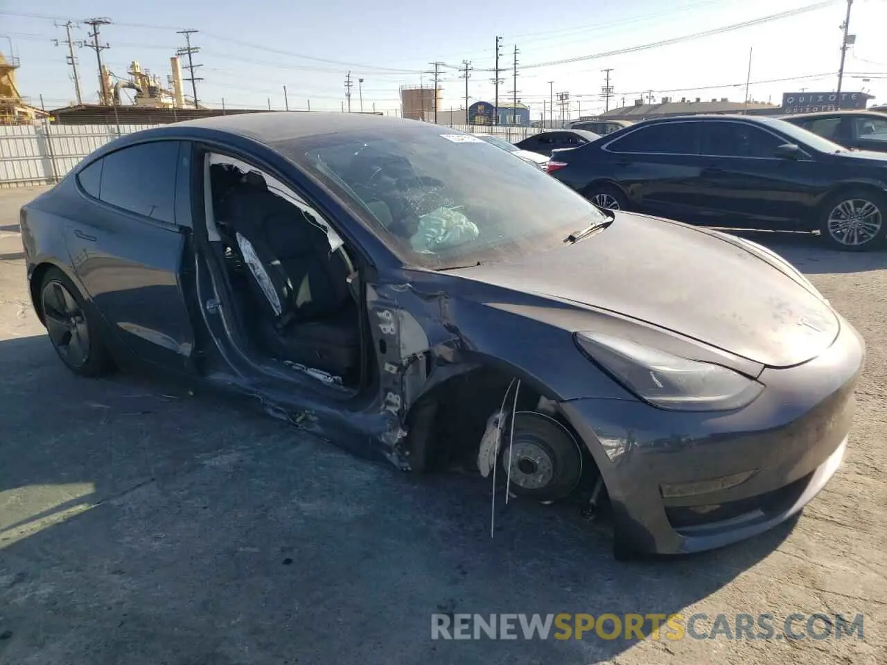 4 Photograph of a damaged car 5YJ3E1EA8PF411034 TESLA MODEL 3 2023
