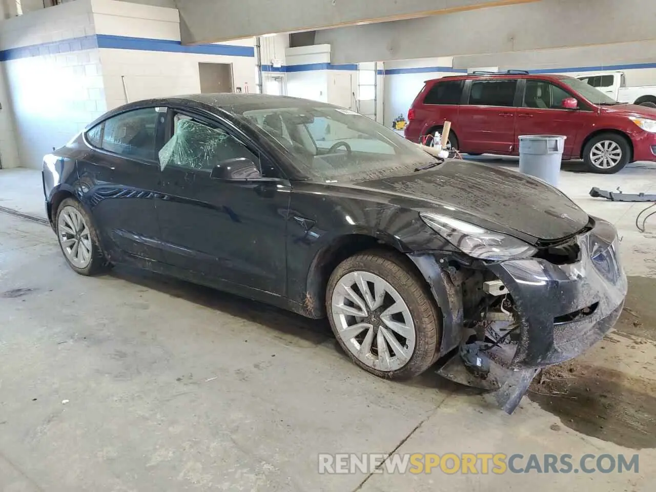 4 Photograph of a damaged car 5YJ3E1EA8PF434958 TESLA MODEL 3 2023