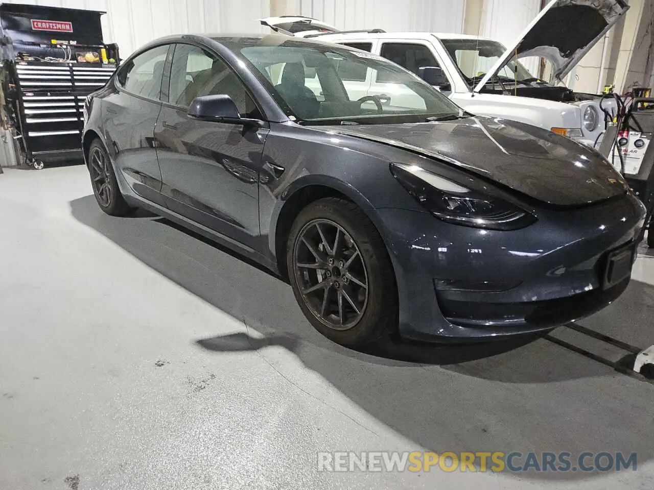 4 Photograph of a damaged car 5YJ3E1EA8PF447841 TESLA MODEL 3 2023
