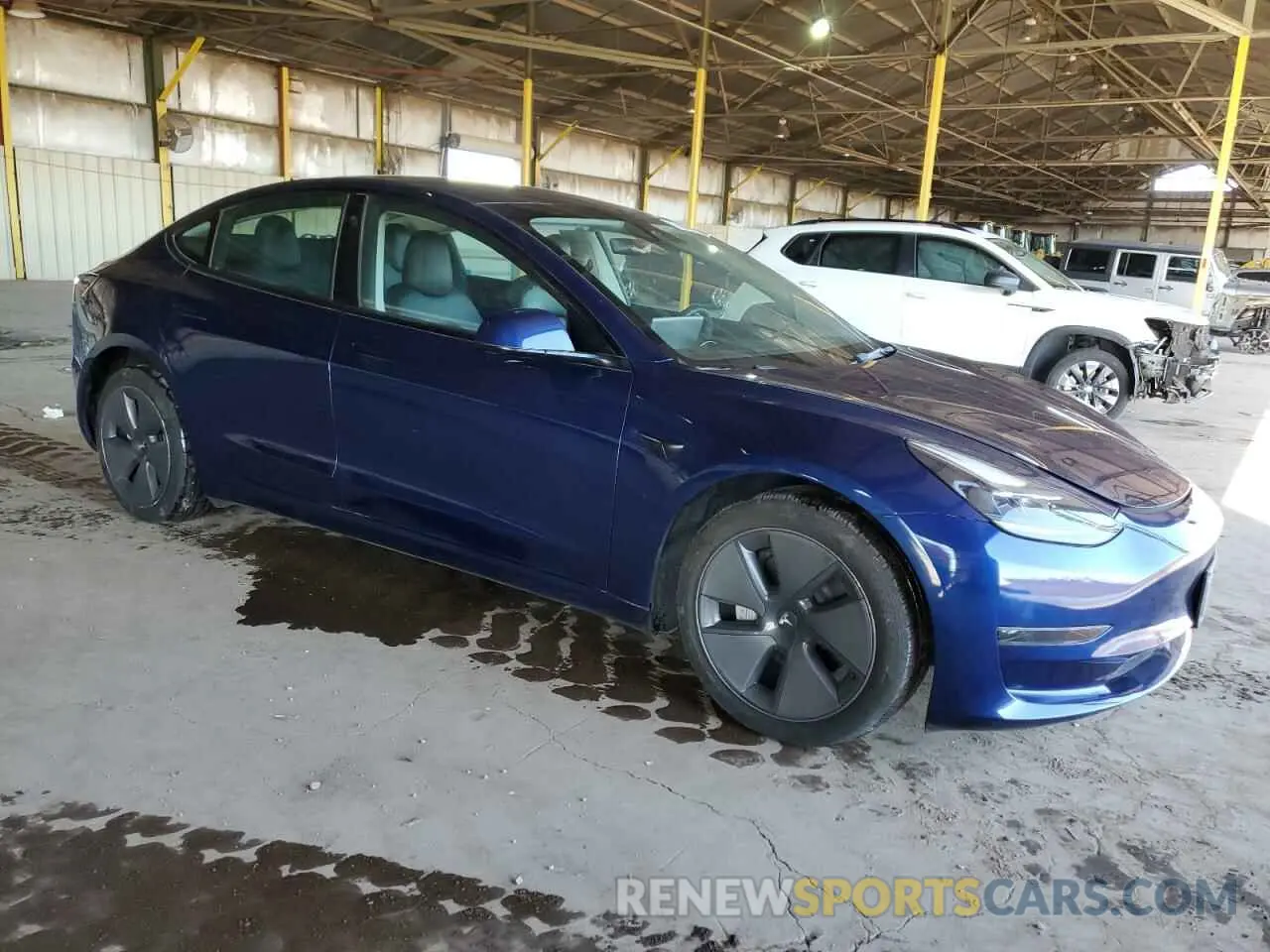 4 Photograph of a damaged car 5YJ3E1EA8PF448200 TESLA MODEL 3 2023