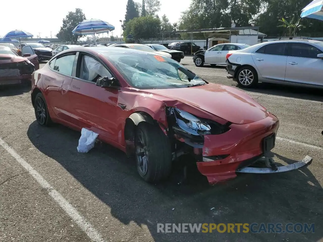 4 Photograph of a damaged car 5YJ3E1EA8PF450111 TESLA MODEL 3 2023