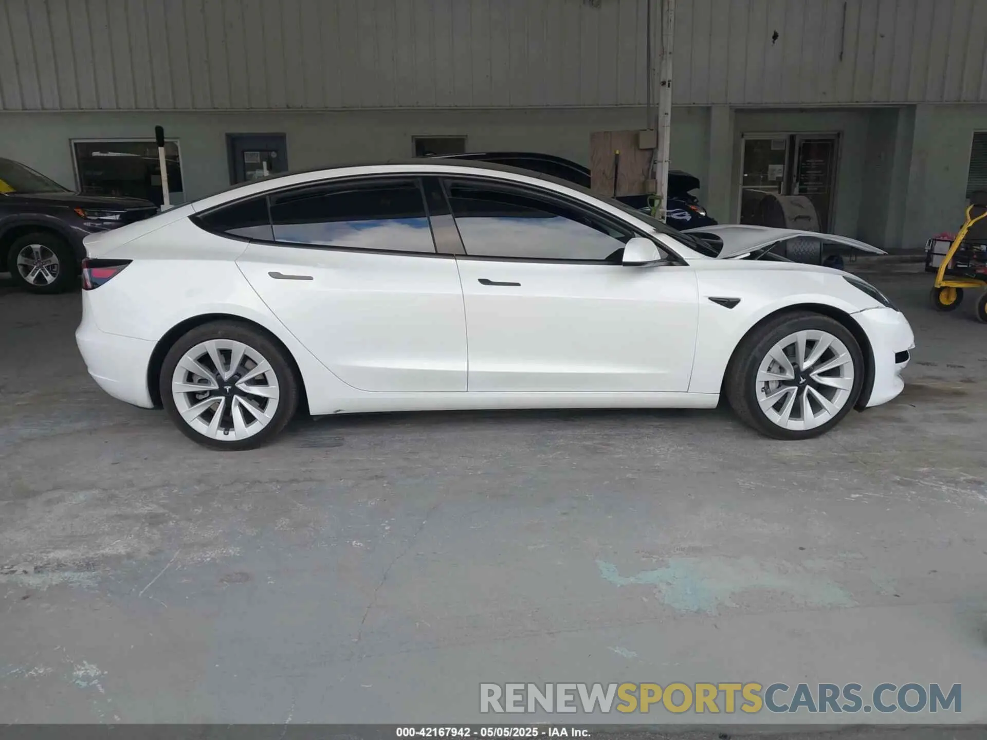 13 Photograph of a damaged car 5YJ3E1EA8PF518326 TESLA MODEL 3 2023