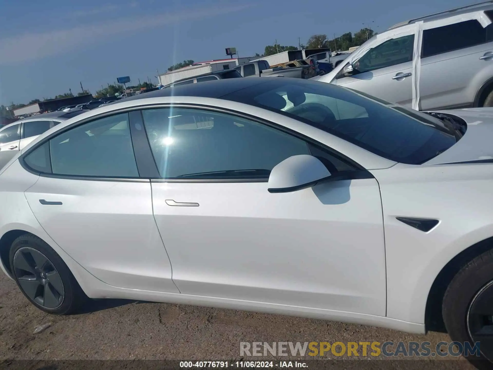 12 Photograph of a damaged car 5YJ3E1EA8PF570278 TESLA MODEL 3 2023