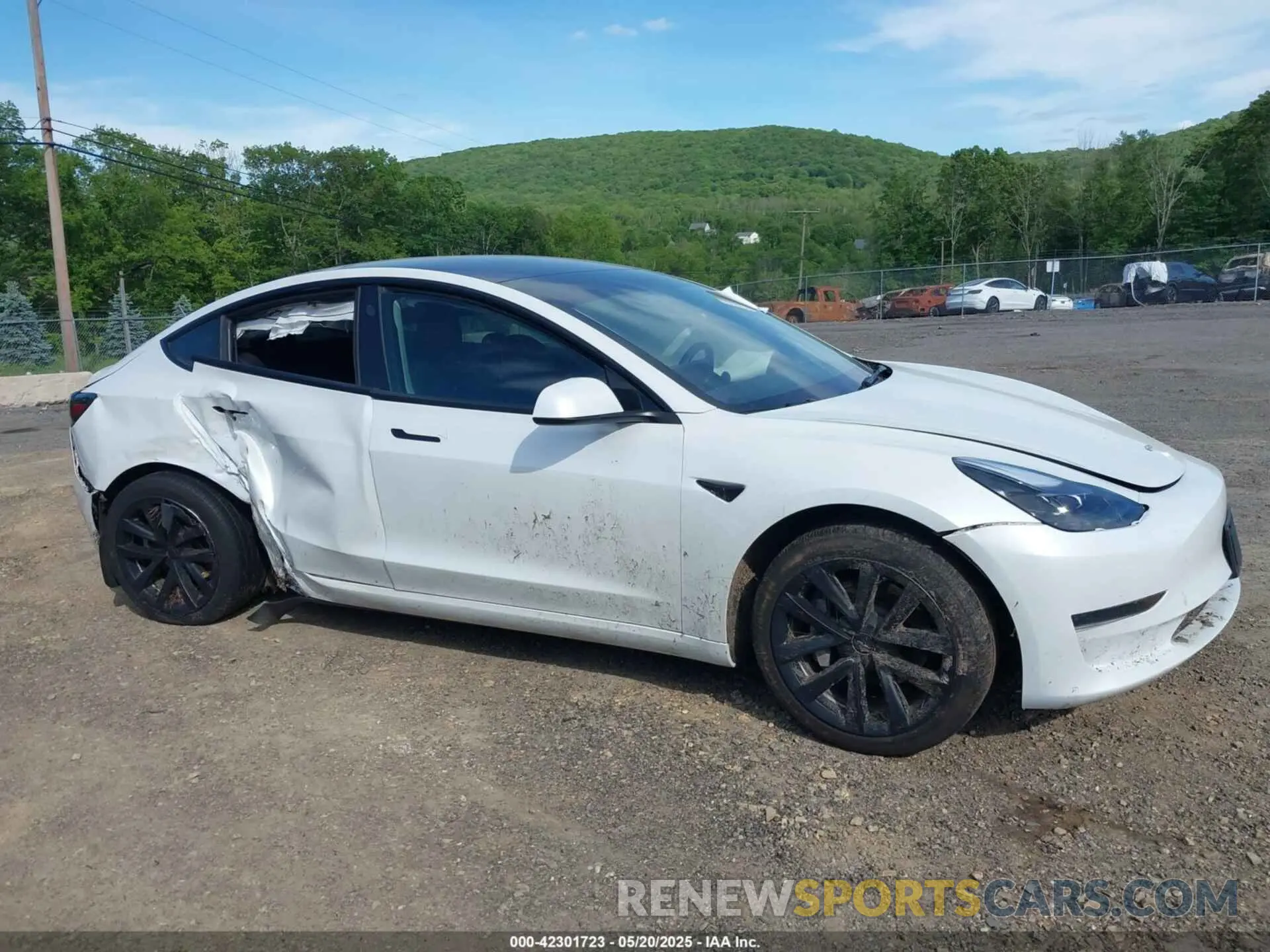 12 Photograph of a damaged car 5YJ3E1EA8PF575061 TESLA MODEL 3 2023