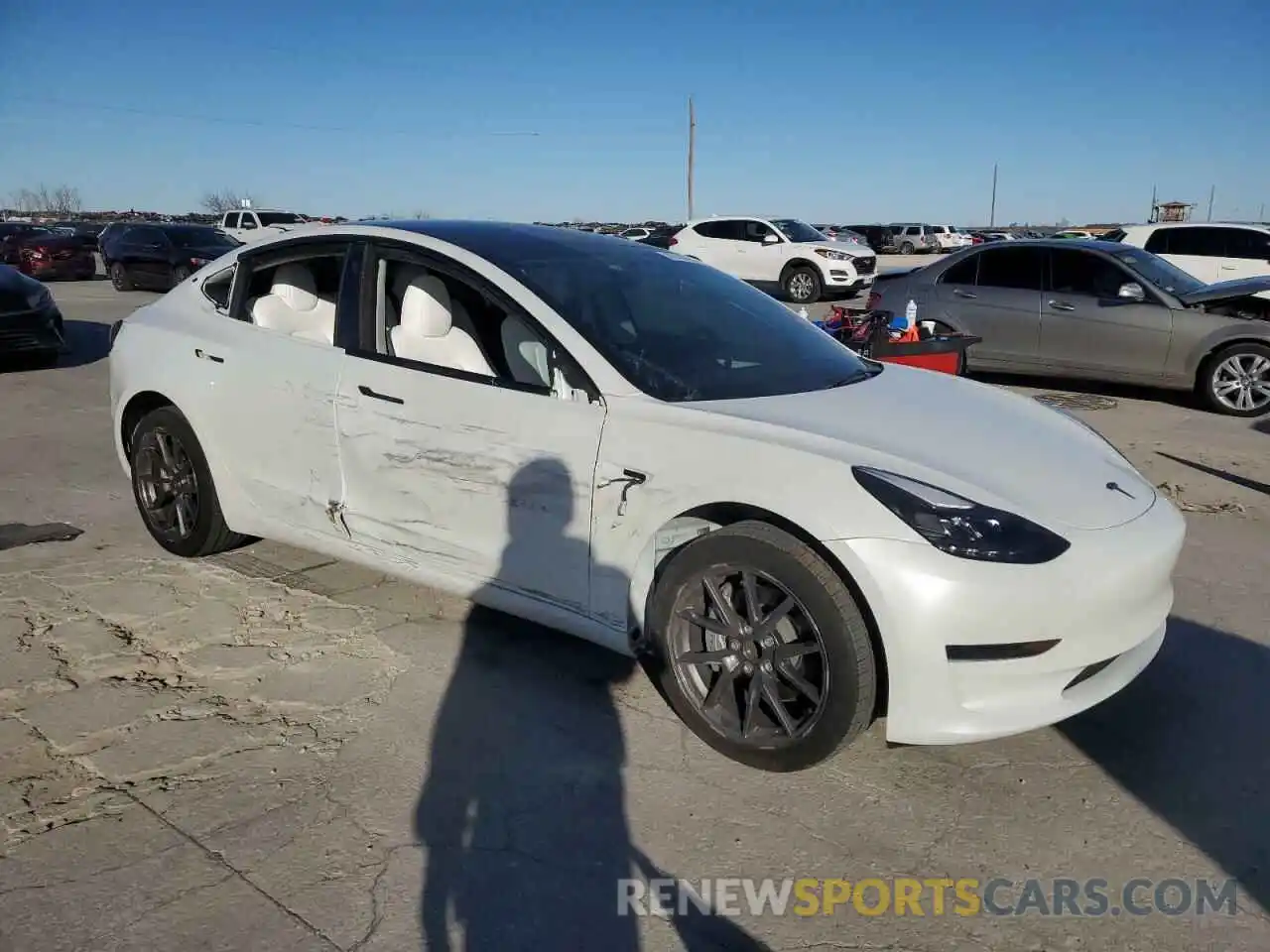 4 Photograph of a damaged car 5YJ3E1EA8PF600699 TESLA MODEL 3 2023