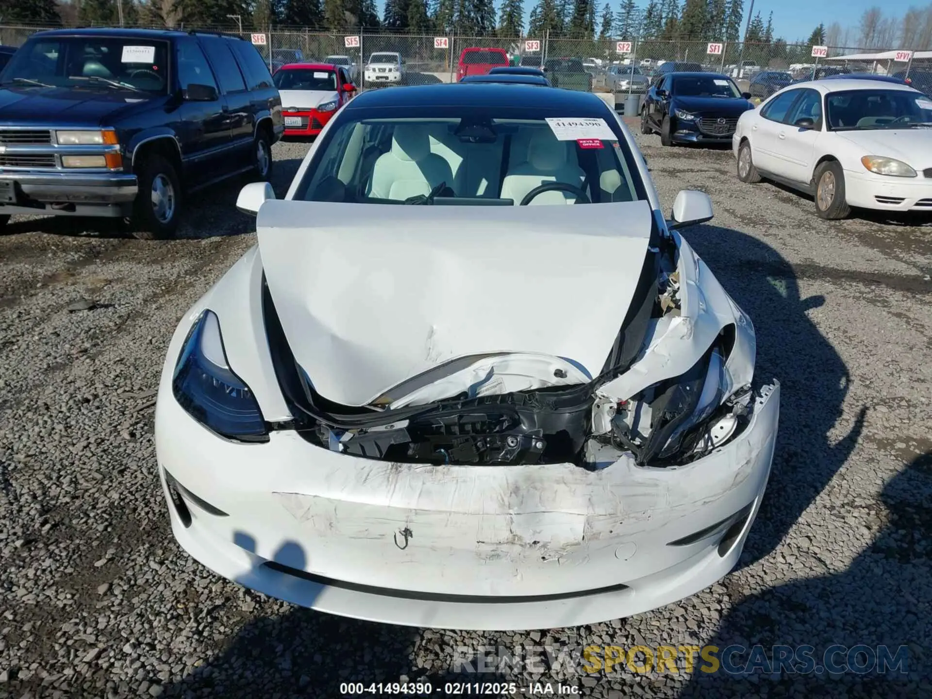 12 Photograph of a damaged car 5YJ3E1EA8PF604722 TESLA MODEL 3 2023