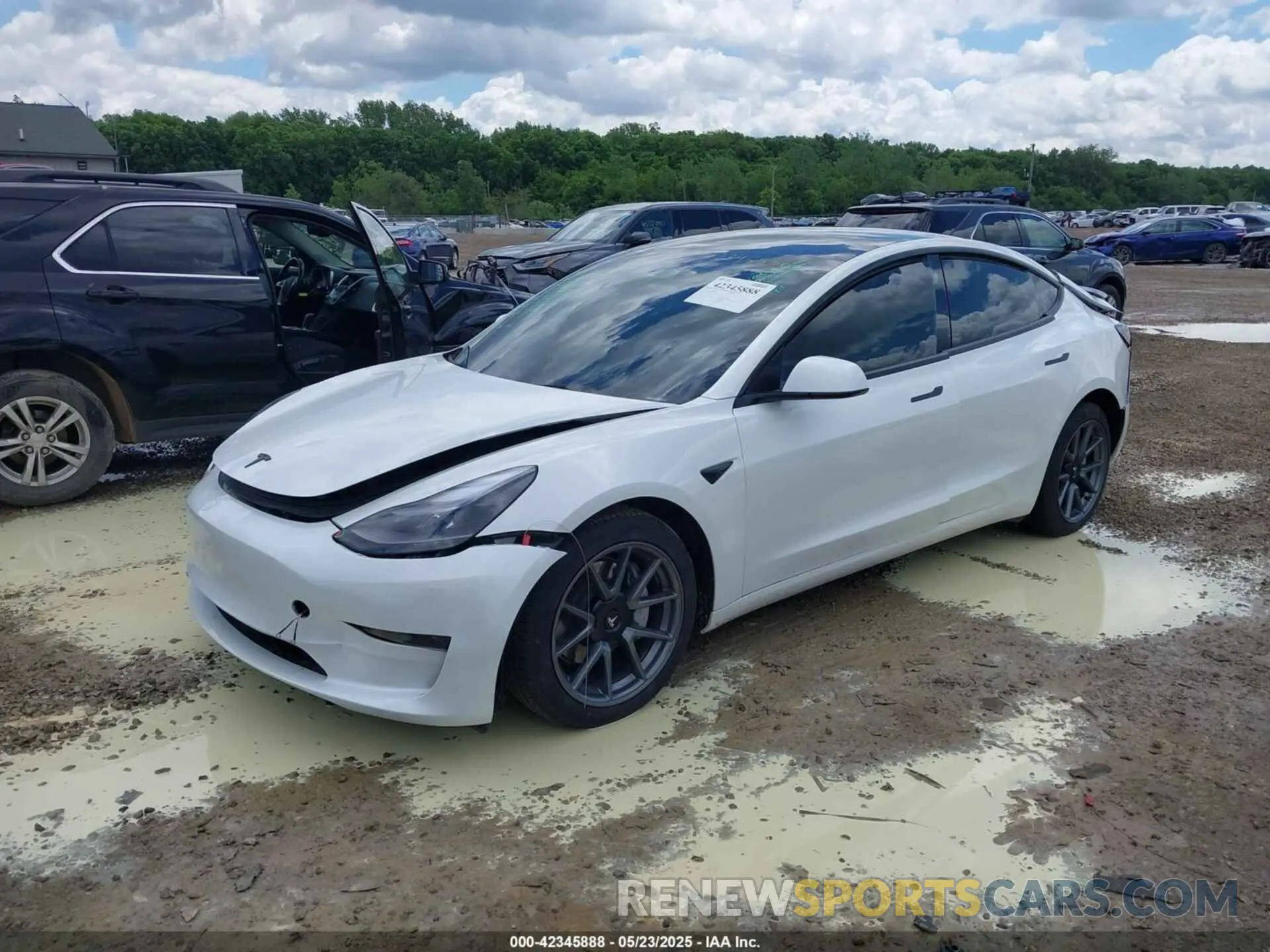 2 Photograph of a damaged car 5YJ3E1EA8PF608429 TESLA MODEL 3 2023