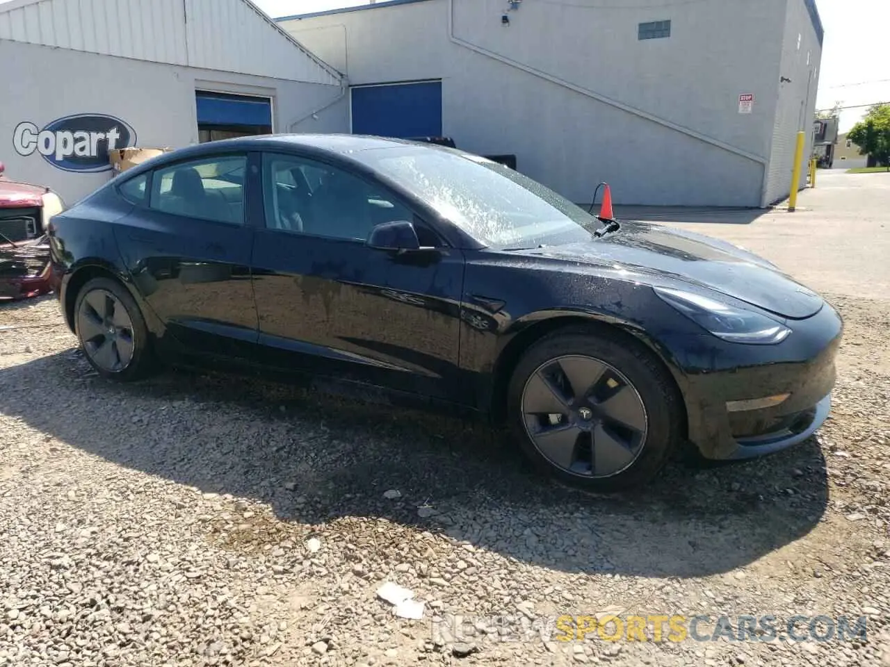 4 Photograph of a damaged car 5YJ3E1EA8PF664094 TESLA MODEL 3 2023