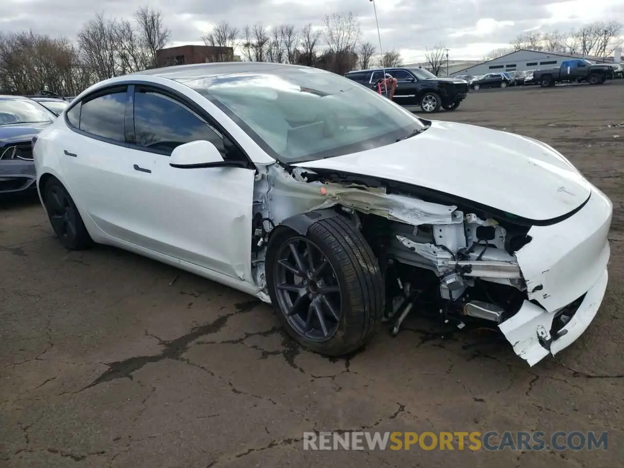 4 Photograph of a damaged car 5YJ3E1EA8PF671322 TESLA MODEL 3 2023