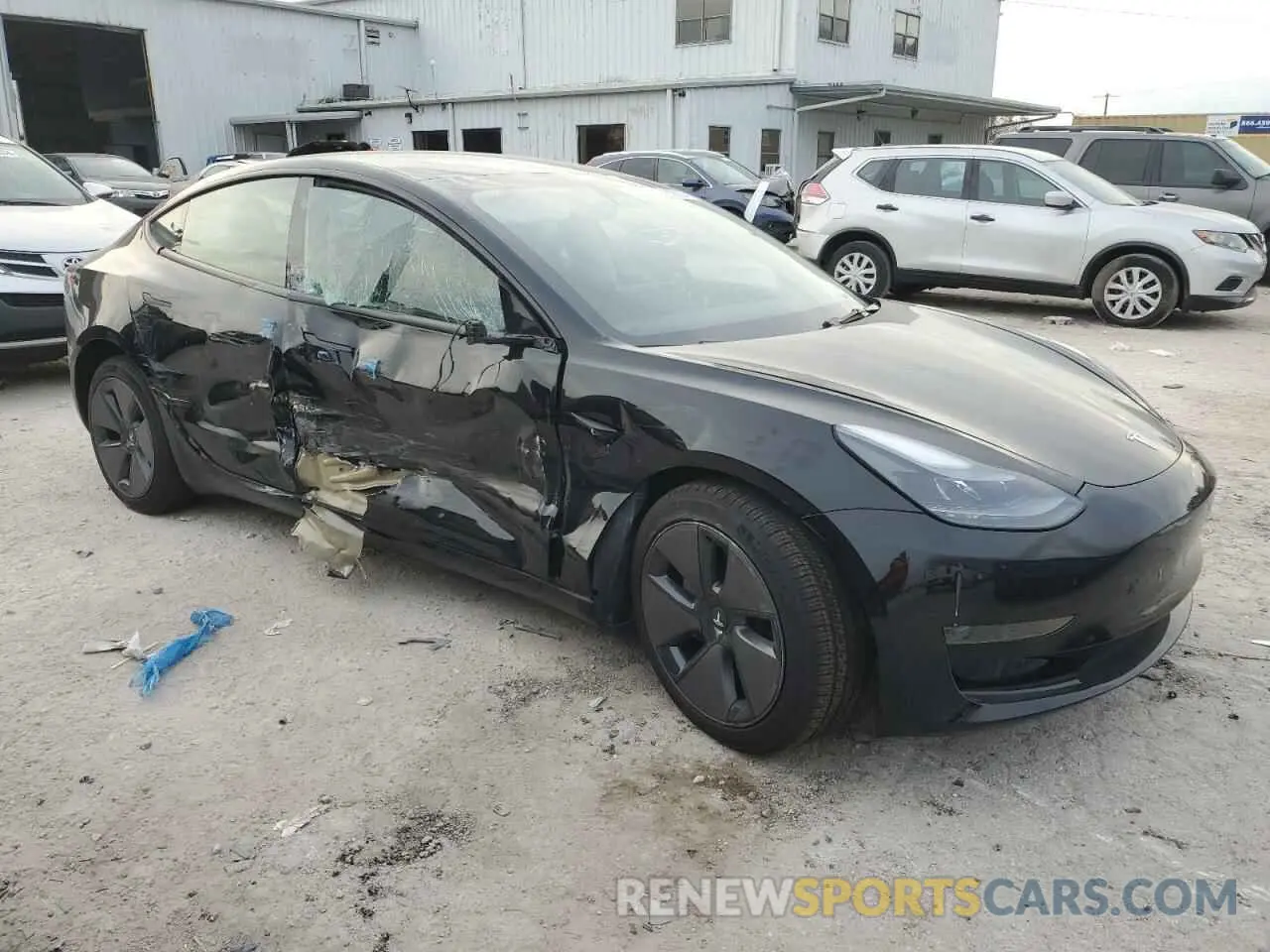 4 Photograph of a damaged car 5YJ3E1EA8PF679520 TESLA MODEL 3 2023