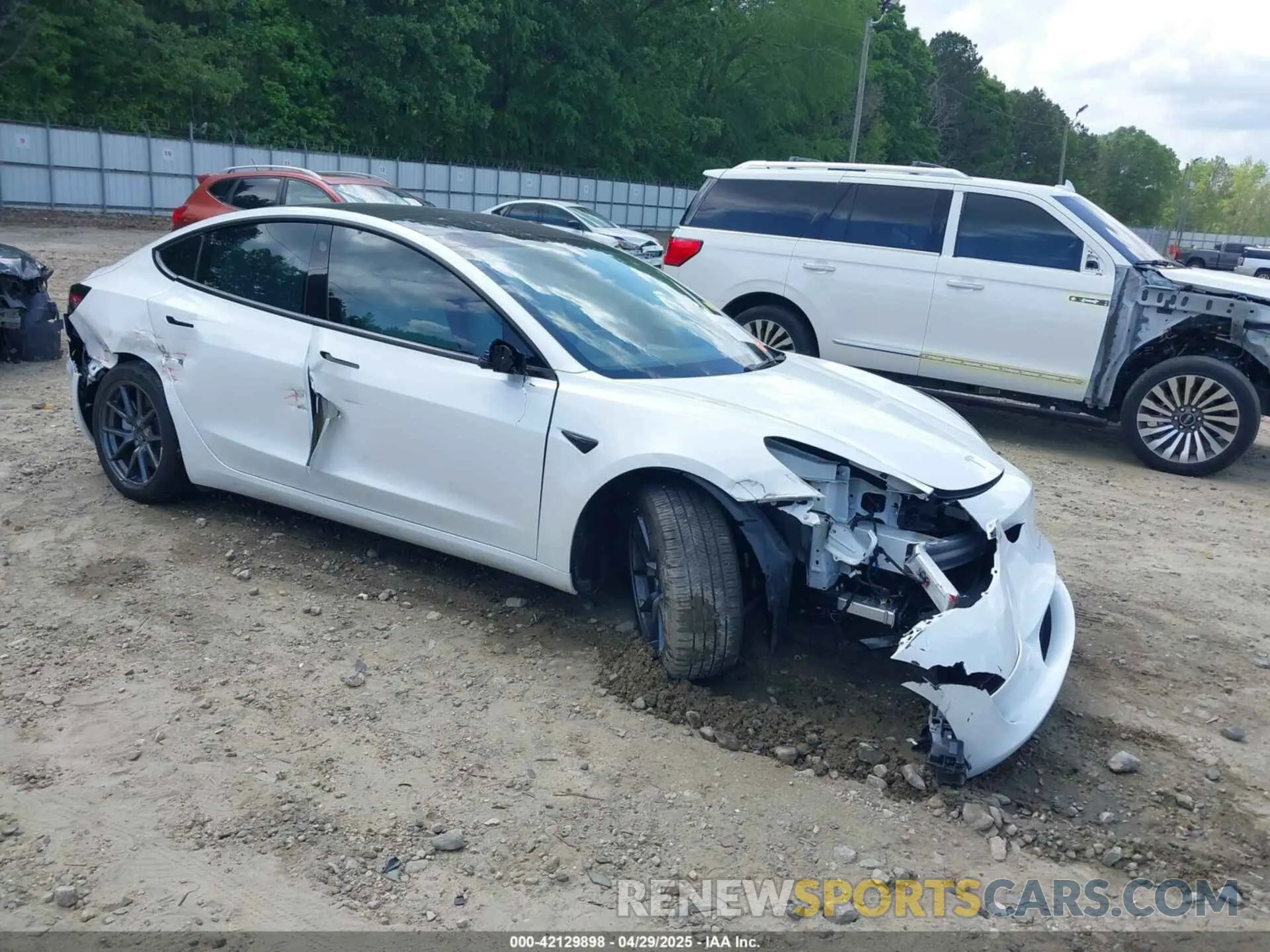 1 Photograph of a damaged car 5YJ3E1EA8PF690033 TESLA MODEL 3 2023