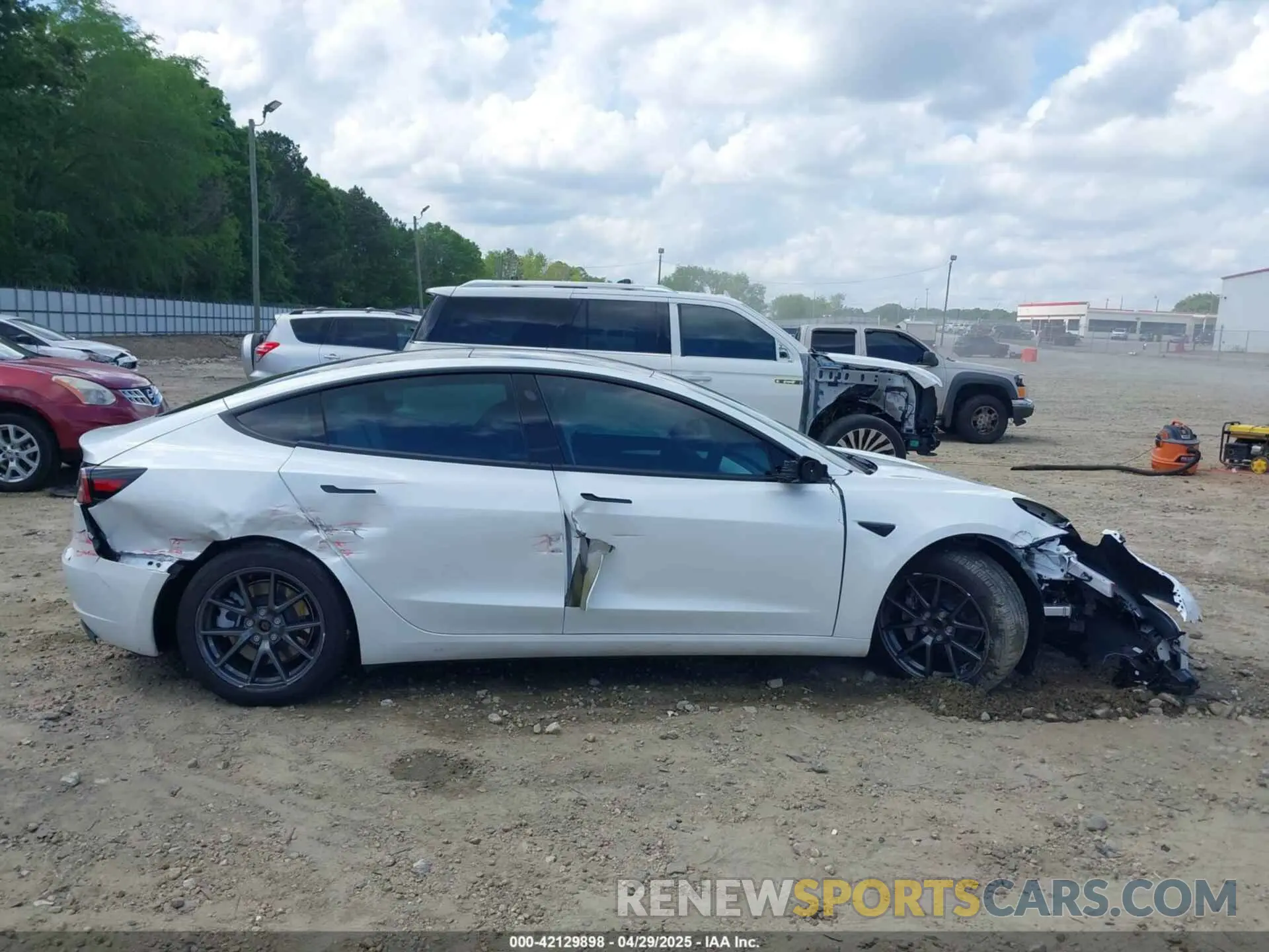 13 Photograph of a damaged car 5YJ3E1EA8PF690033 TESLA MODEL 3 2023
